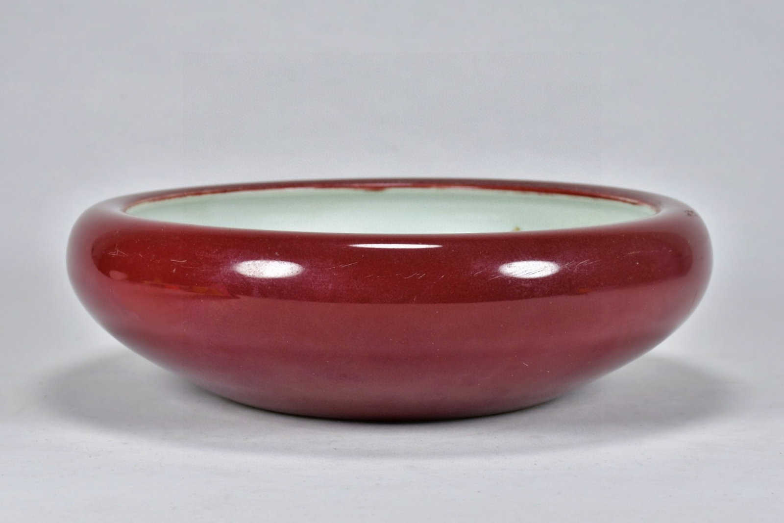 An Exquisite Ji Red Glazed Blue and White Animal Pattern Brush Washer: An Exquisite Ji Red Glazed Blue and White Animal Pattern Brush Washer,Qing Dynasty,China,Size:3.1inx10.6in 霁红釉青花动物纹笔洗,中