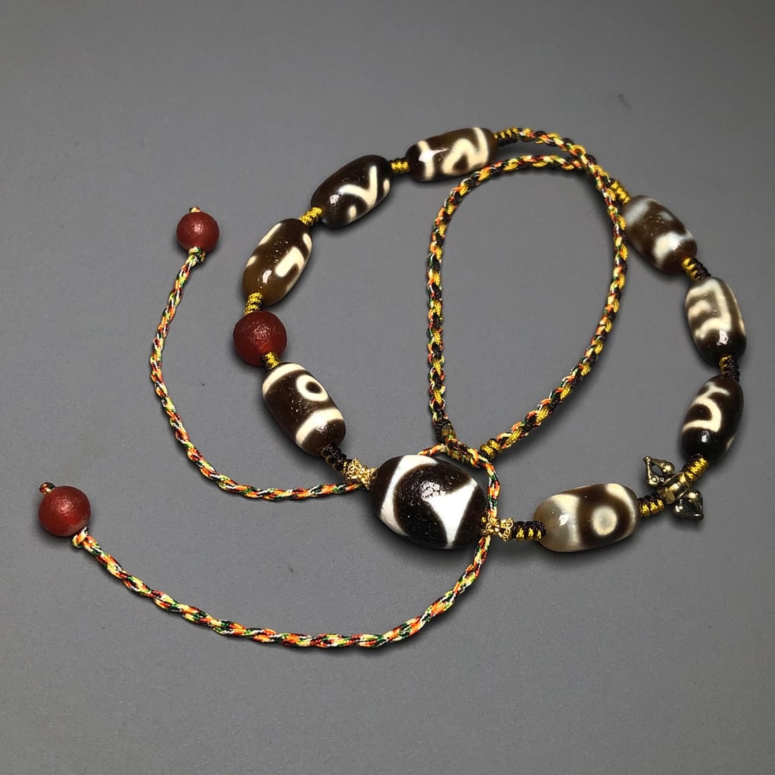 A Precious Dzi Bead Necklace: A Precious Dzi Bead Necklace,Size:0.7inx0.6in 天珠项链