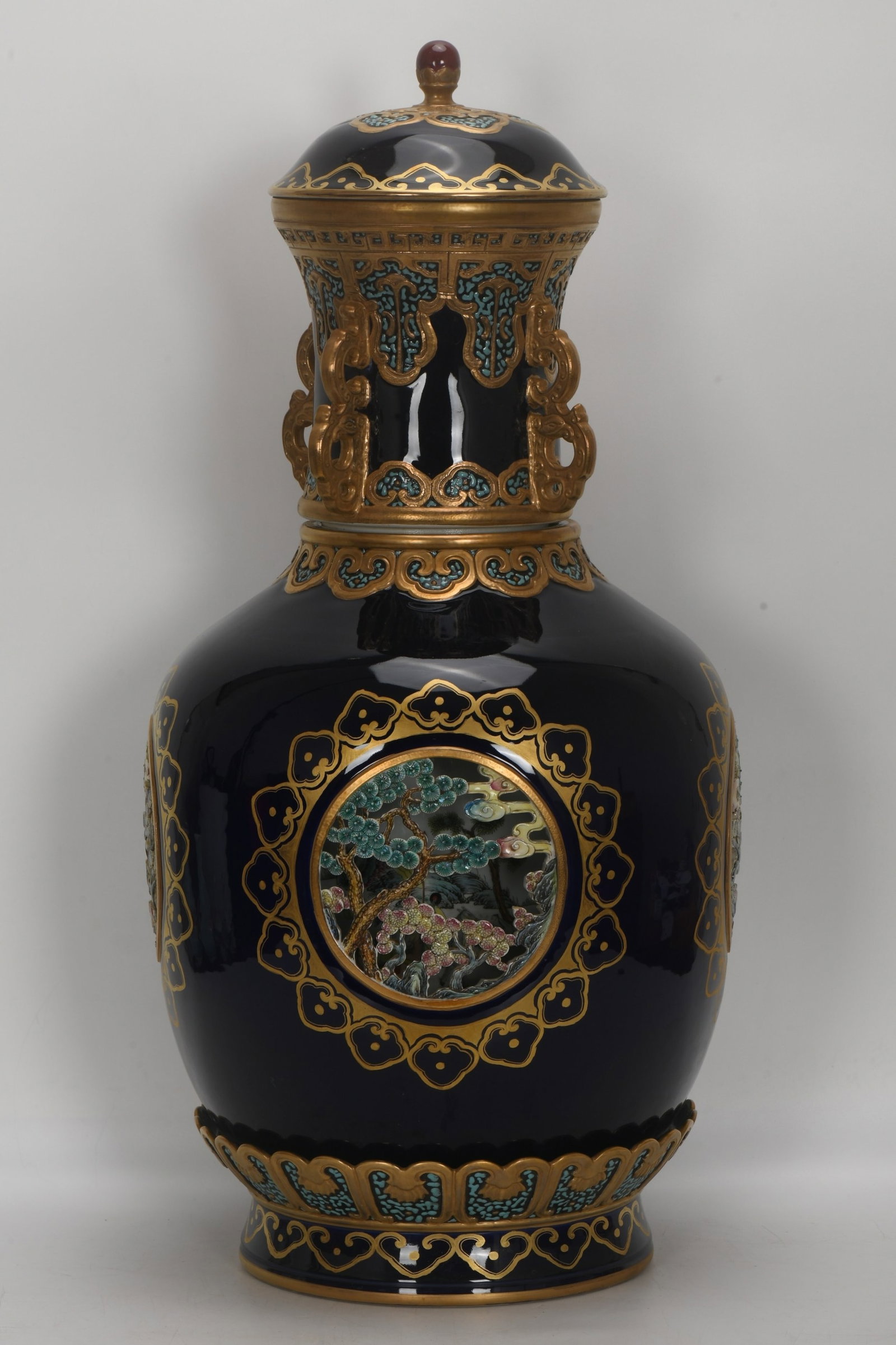 A Rare Ji Blue Glazed Painted Gold Landscape Pattern Bottle: A Rare Ji Blue Glazed Painted Gold Landscape Pattern Bottle,Qing Dynasty,China,Qianlong Six-character Mark,Size:29.5inx14.8in 霁蓝釉描金山水纹盖&#