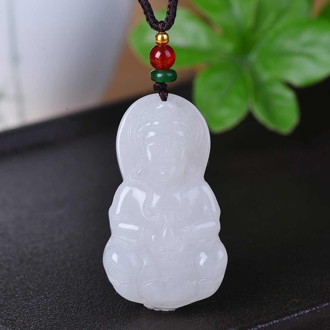 An Exquisite Jadeite Statue of Avalokitesvara Pendant: An Exquisite Jadeite Statue of Avalokitesvara Pendant,Size:1.1inx1.8in 翡翠观音挂件