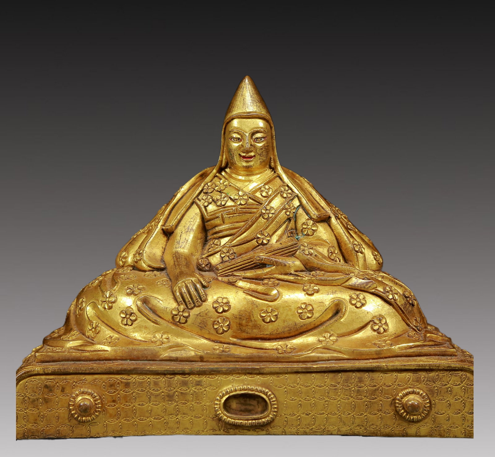 A Solemn Gilt Bronze Statue of Guru,With Inscription: A Solemn Gilt Bronze Statue of Guru,With Inscription,Ming Dynasty, China,Size:7.1inx5.1inx5.5in,Weight:2040g 铜鎏金上师像，带铭文，
