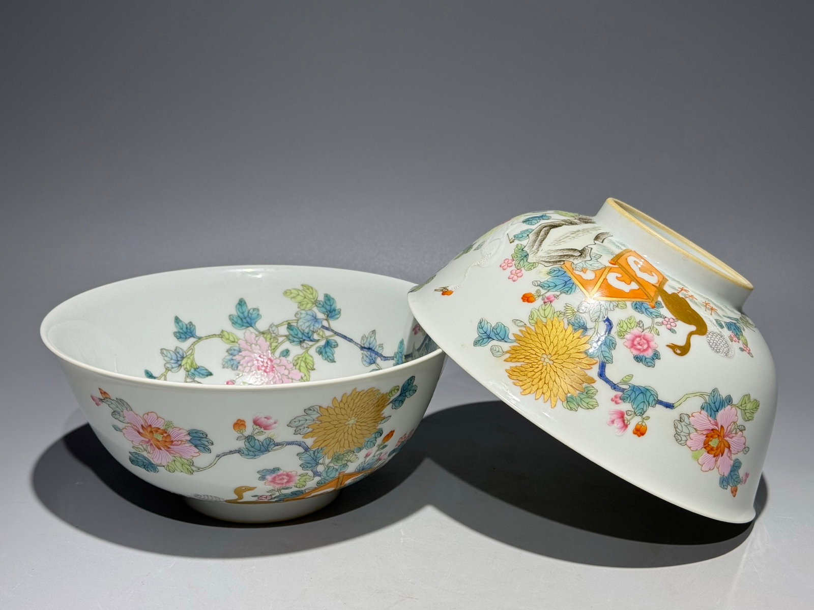 A Pair of Exquisite Famille-Rose Flower and Bird Pattern Bowls: A Pair of Exquisite Famille-Rose Flower and Bird Pattern Bowls,Qing Dynasty,China,Yongzheng Six-character Mark,Size:3.1inx6.9in 一对粉彩花鸟纹碗,中