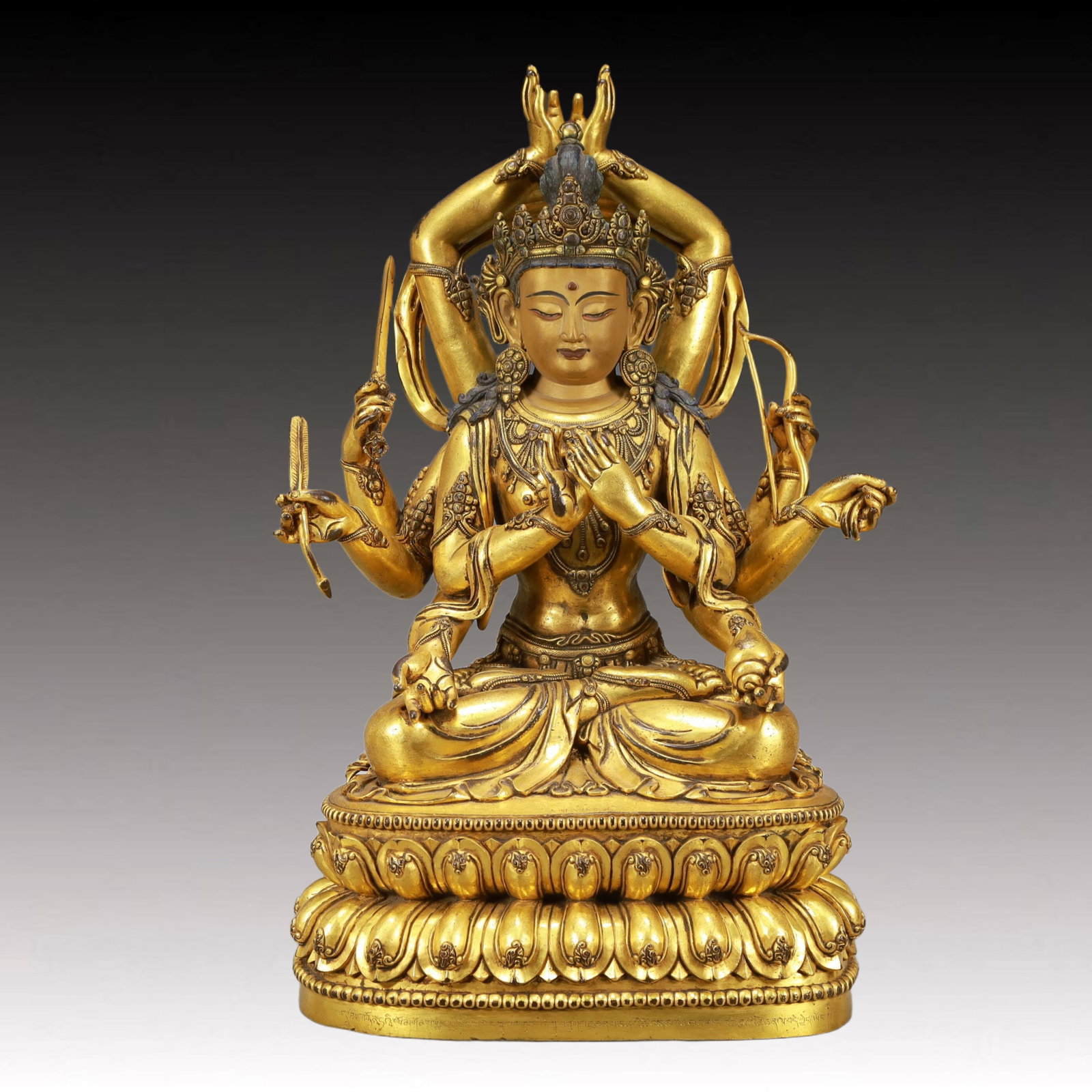 A Solemn Gilt Bronze Statue of Ten-Armed Guanyin: A Solemn Gilt Bronze Statue of Ten-Armed Guanyin,Ming Dynasty, China,Xuande Six-character Mark,Size:11.8inx8.7inx20.1in,Weight:19950g 铜鎏金十臂观音像,&