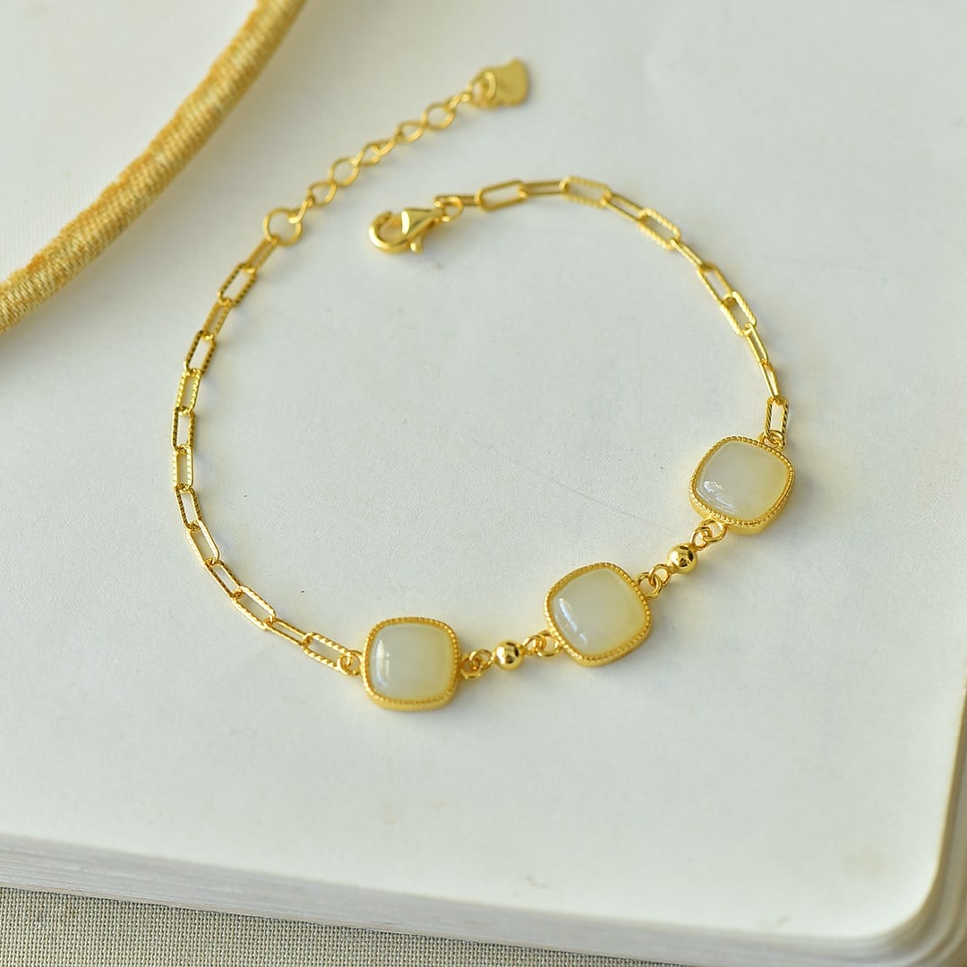 An Exquisite Sterling Silver-Gold Plated Inlaid White Jade Bracelet (1 of 6)