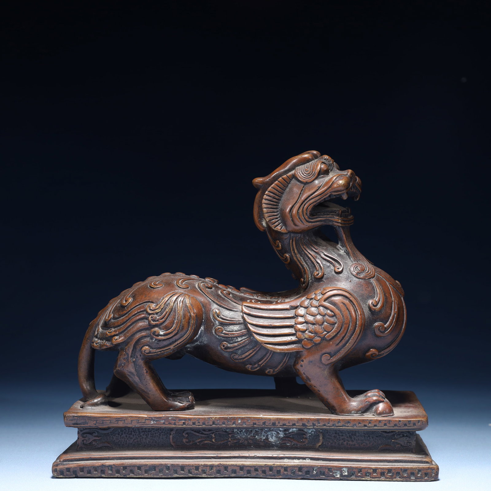 An Exquisite Bronze Auspicious Beast Ornament: An Exquisite Bronze Auspicious Beast Ornament,Qing Dynasty,China,Size:7.5inx3.5inx2.4in,Weight:2250g 铜瑞兽摆件,中国清代