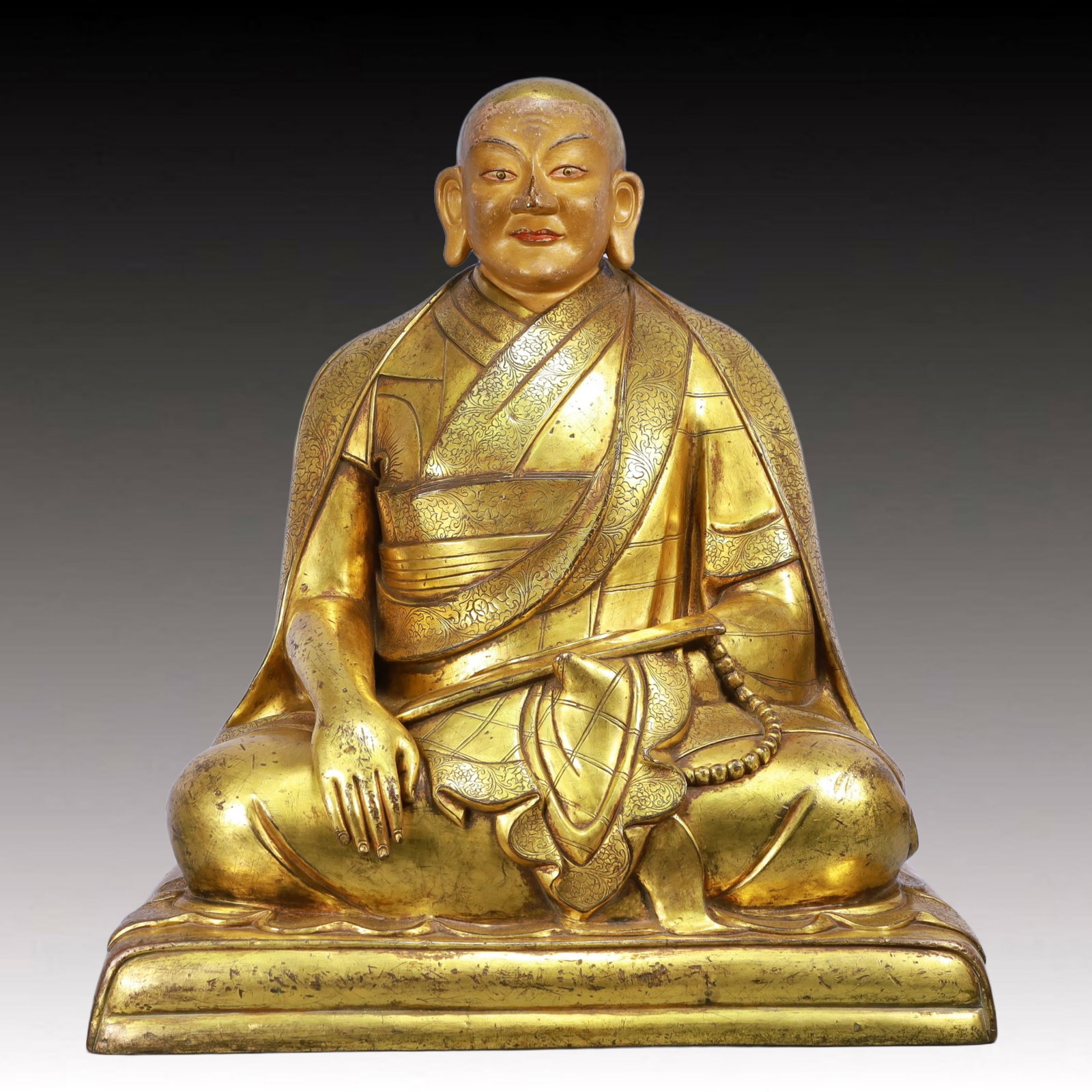 A Solemn Gilt Bronze Statue of Guru: A Solemn Gilt Bronze Statue of Guru,Ming Dynasty, China,Size:20.1inx12.6inx23.6in,Weight:41550g 铜鎏金上师像,中国明代
