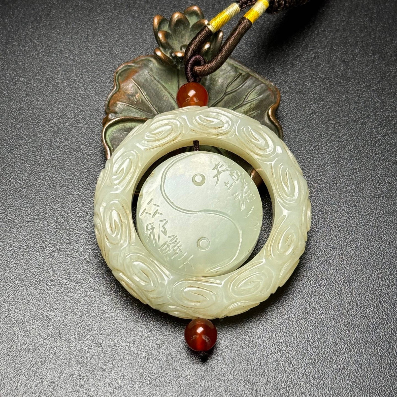 An Exquisite White Jade Trigram Pattern Pendant: An Exquisite White Jade Trigram Pattern Pendant,Qing Dynasty,China,Size:2.1inx0.4in,Weight:55g 白玉八卦纹挂件,中国清代