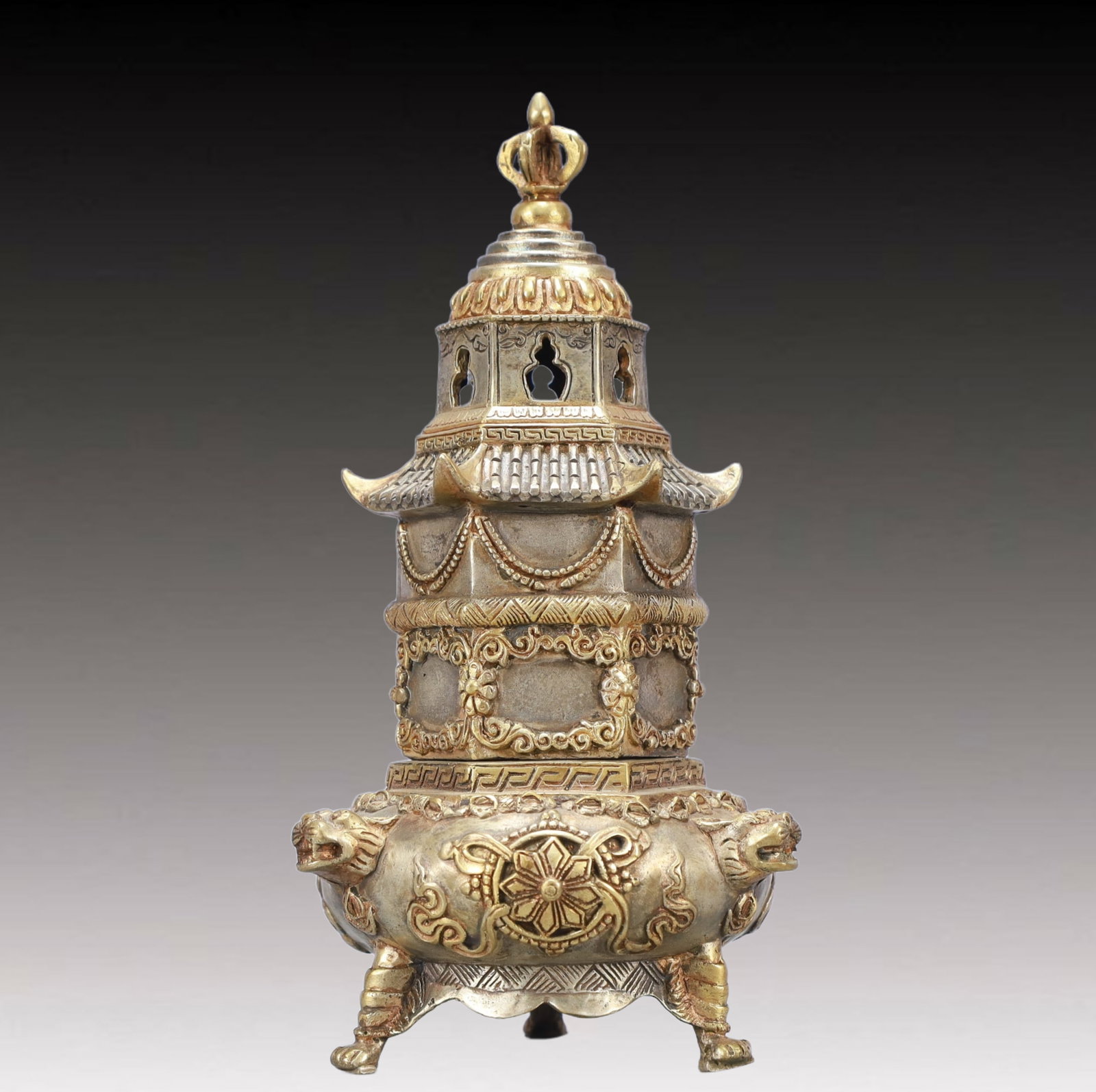 A Rare Gilt Silver Eight Treasures Pattern Beast-Ears and Tripod Censer: A Rare Gilt Silver Eight Treasures Pattern Beast-Ears and Tripod Censer,Qing Dynasty, China,Size:4.5inx8.5in,Weight:700g