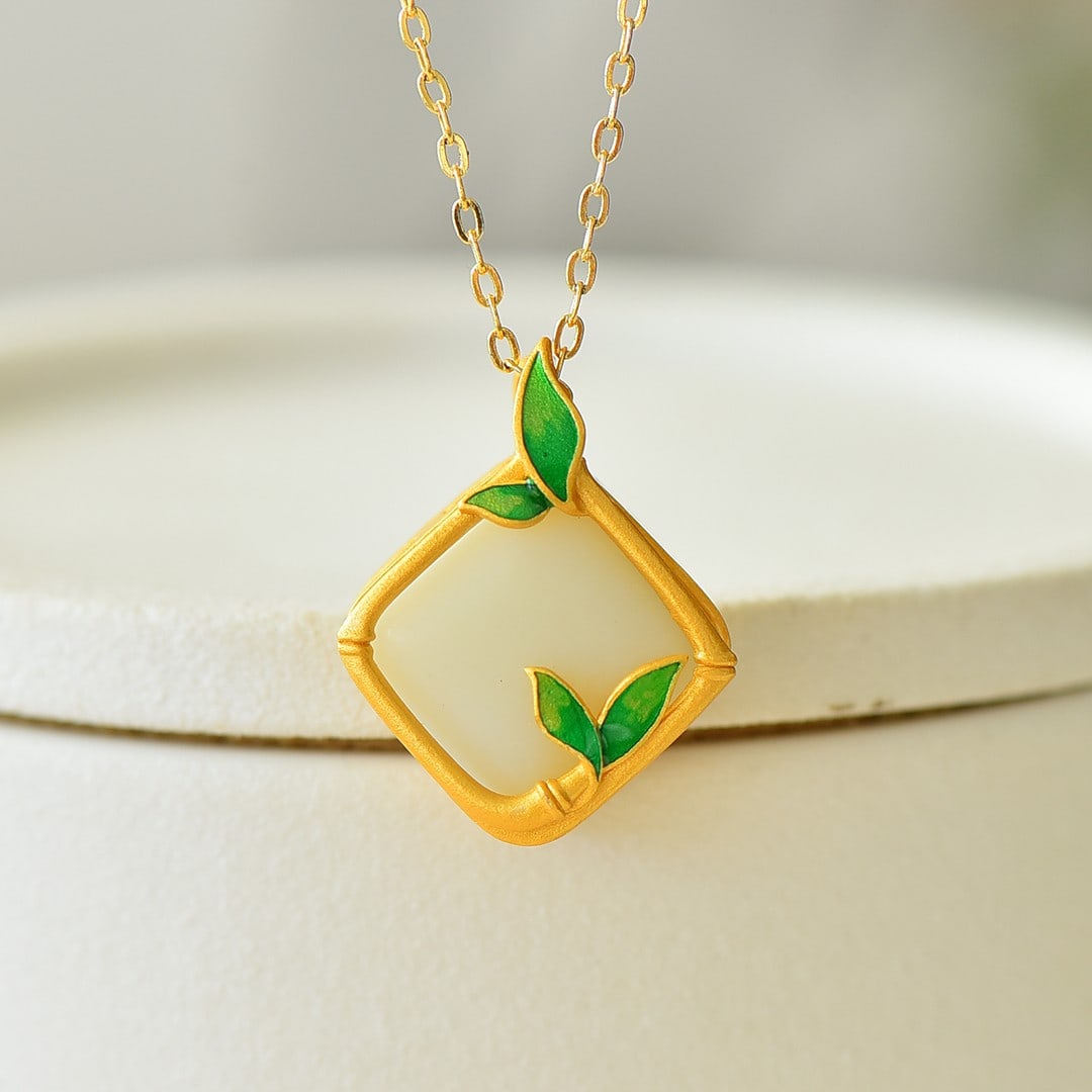 An Exquisite Sterling Silver-Gold Plated Inlaid White Jade Pendant: An Exquisite Sterling Silver-Gold Plated Inlaid White Jade Pendant 纯银镀金镶白玉吊坠