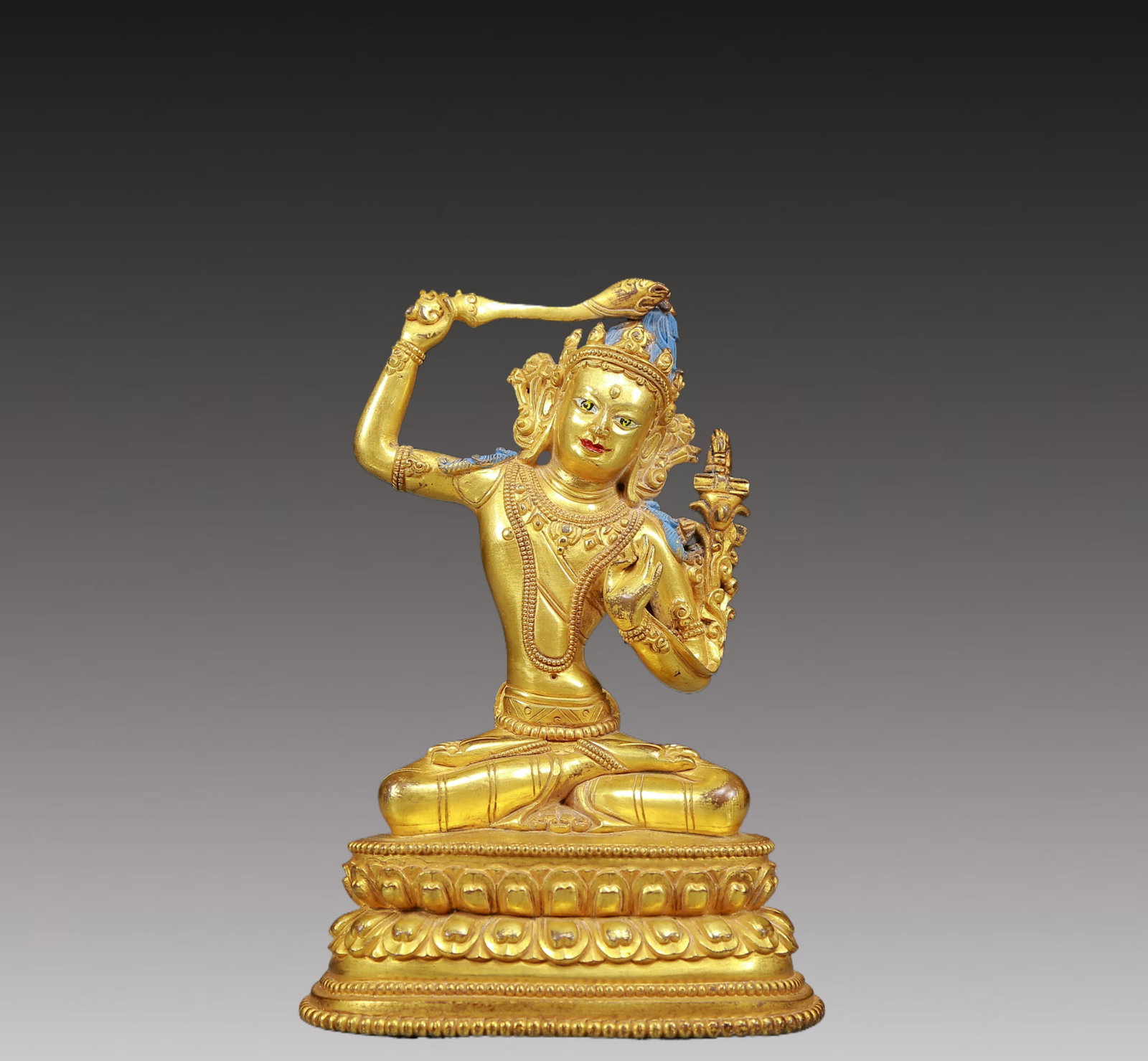 A Solemn Gilt Bronze Statue of Manjusri: A Solemn Gilt Bronze Statue of Manjusri,Ming Dynasty, China,Size:4.3inx3.1inx6.7in,Weight:995g 铜鎏金文殊菩萨像，明代