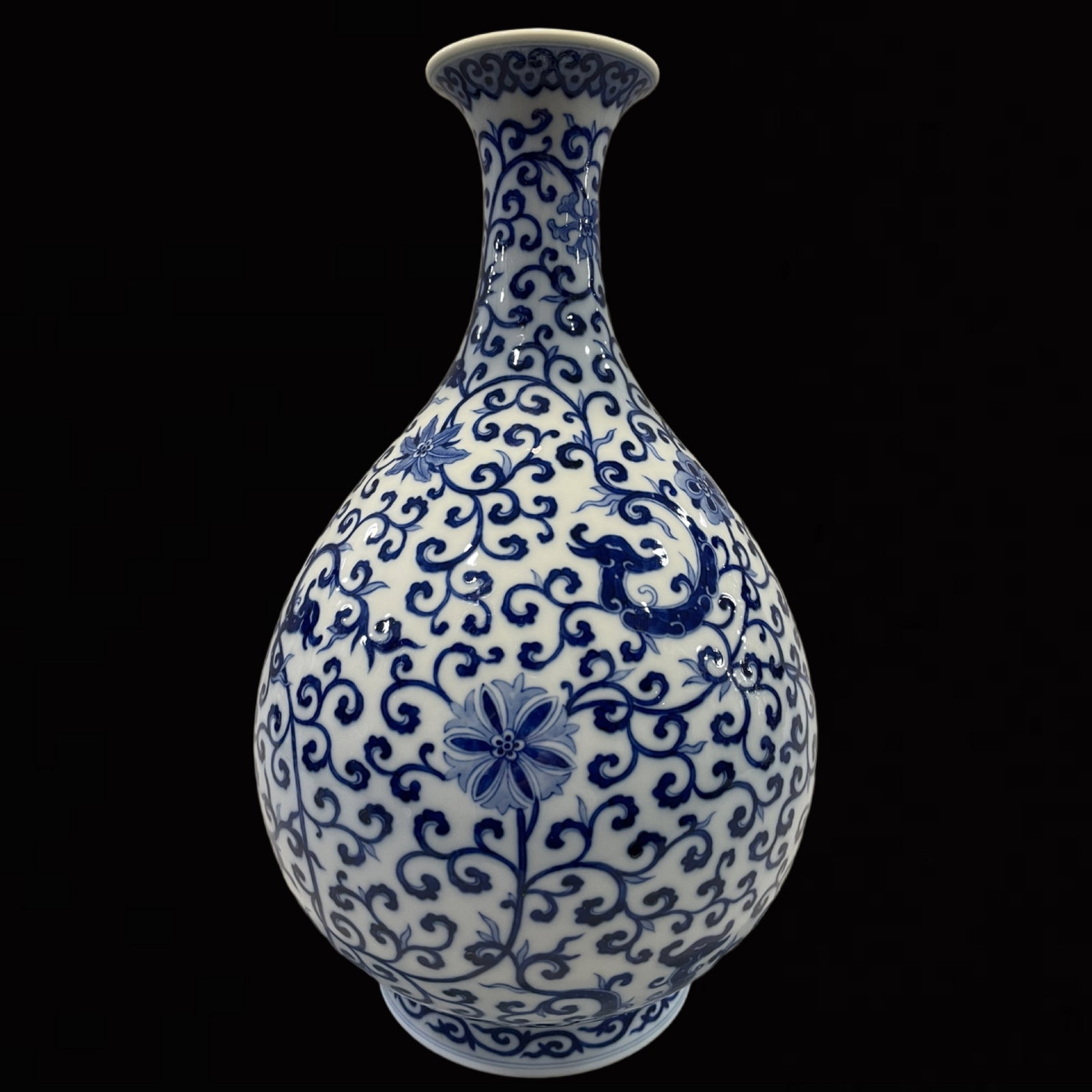 A Rare Blue and White Lotus Pattern Vase: A Rare Blue and White Lotus Pattern Vase,Qing Dynasty,China,Qianlong Six-character Mark,Size:13.8inx8.7in