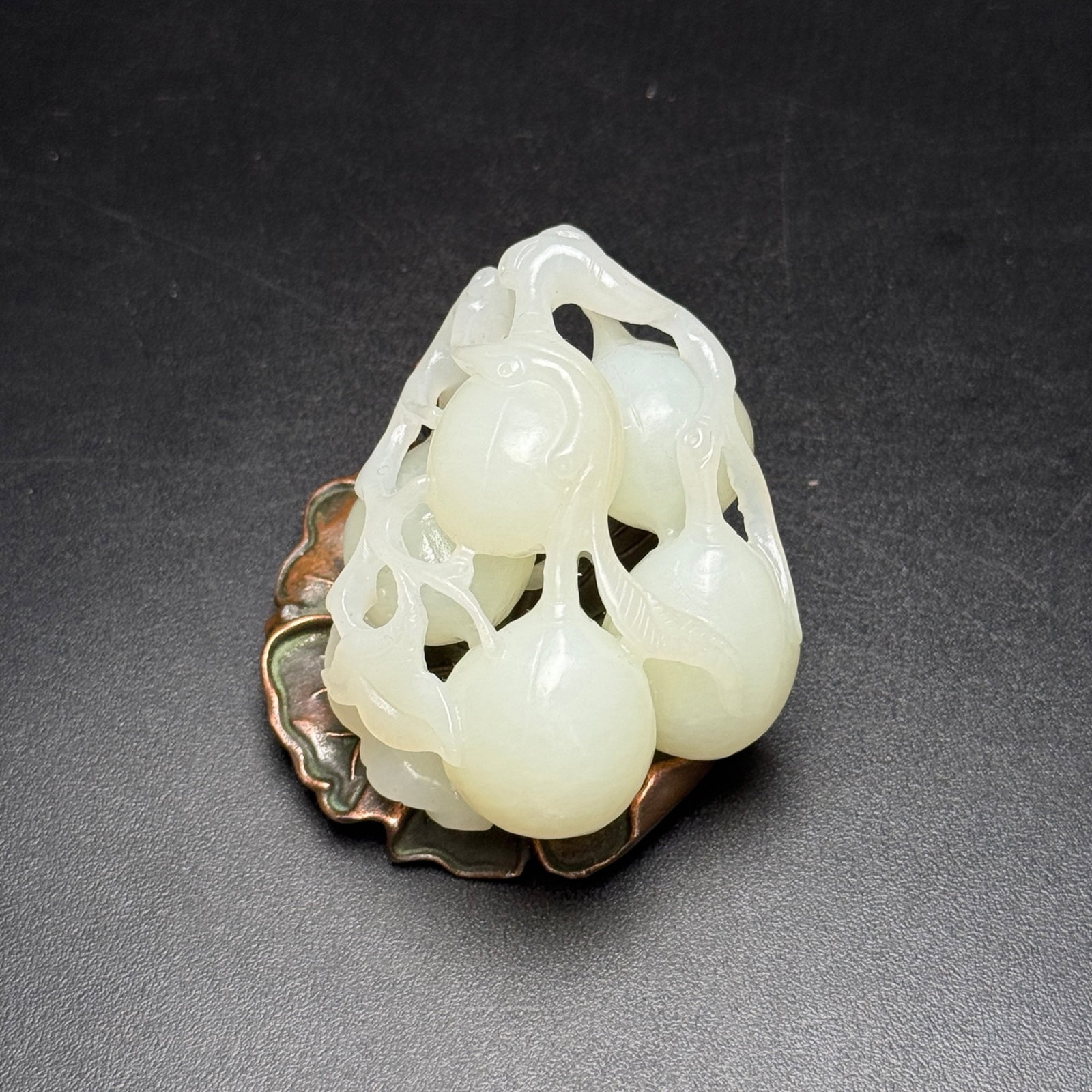 An Exquisite White Jade Peach Ornament: An Exquisite White Jade Peach Ornament,Qing Dynasty,China,Size:2.3inx1.8inx1.1in,Weight:62g 白玉桃子摆件,中国清代