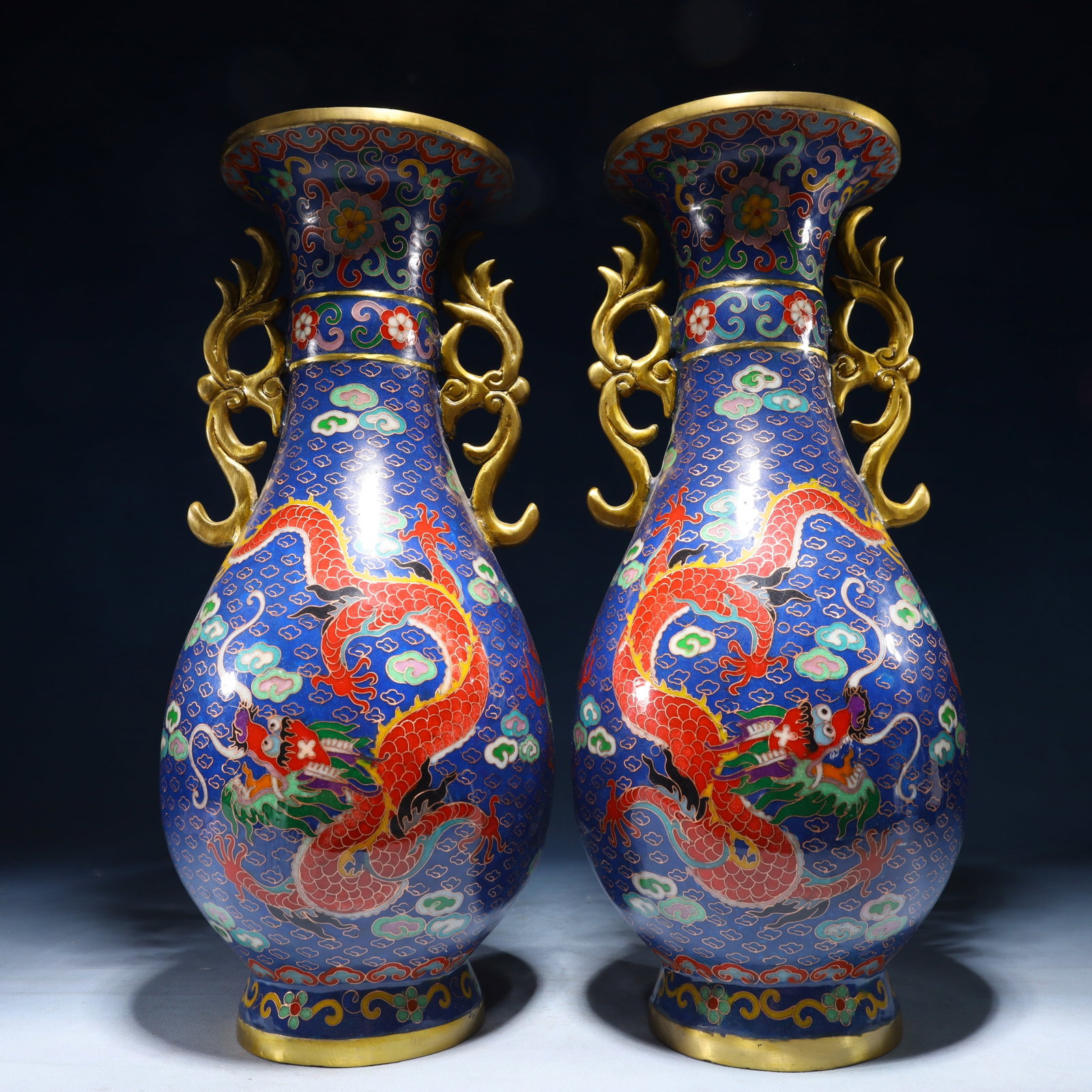 A Pair of Exquisite Cloisonne Auspicious Cloud and Dragon Pattern Double-Ears Vases: A Pair of Exquisite Cloisonne Auspicious Cloud and Dragon Pattern Double-Ears Vases,Qing Dynasty,China,Qianlong Four-character Mark,Size:6.3inx16.1in,Weight:8650g 一对景泰Ŕ