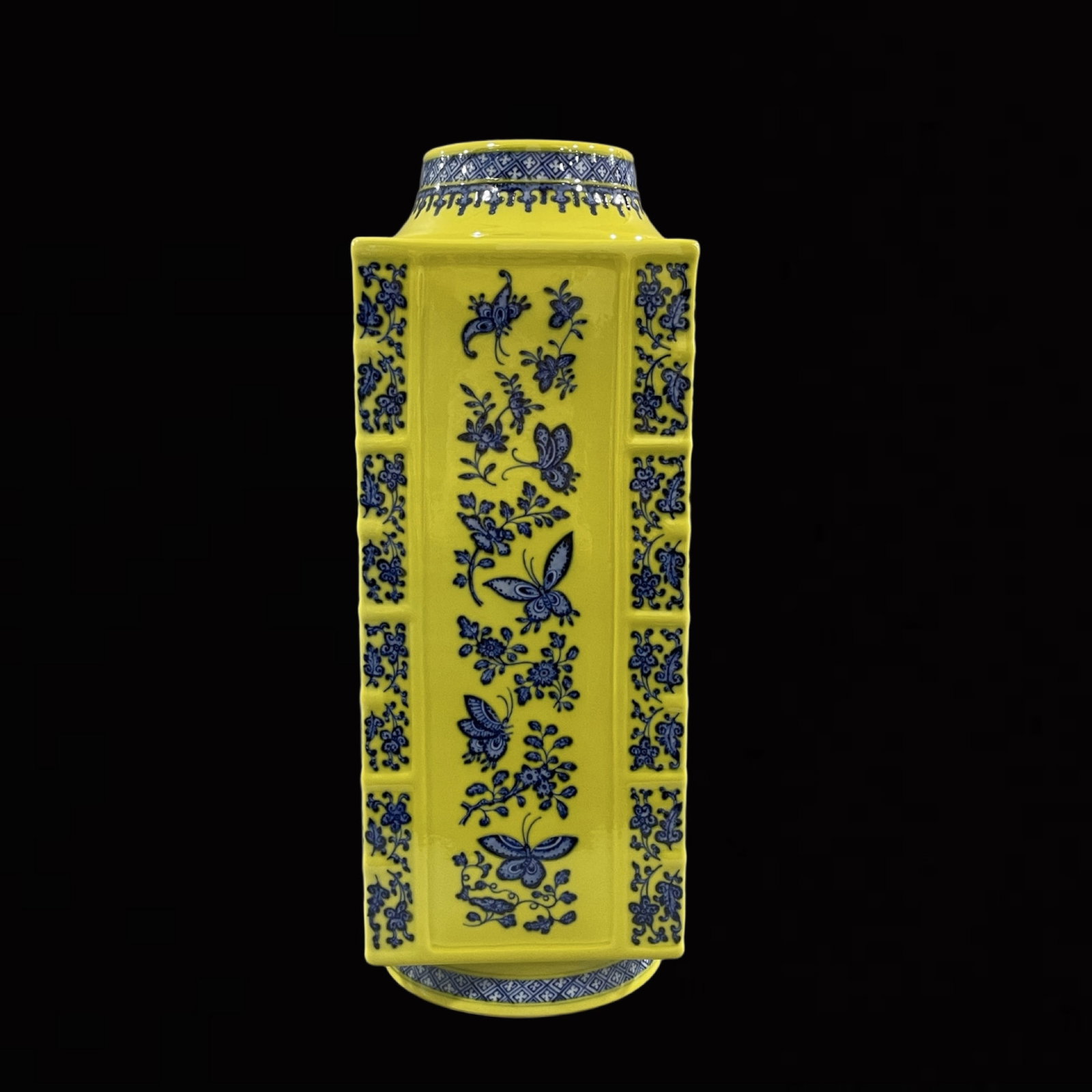 A Rare Yellow Ground Blue and White Flower and Butterfly Pattern Vase: A Rare Yellow Ground Blue and White Flower and Butterfly Pattern Vase,Qing Dynasty,China,Qianlong Six-character Mark,Size:14.4inx5.2in ??????????,????,?????