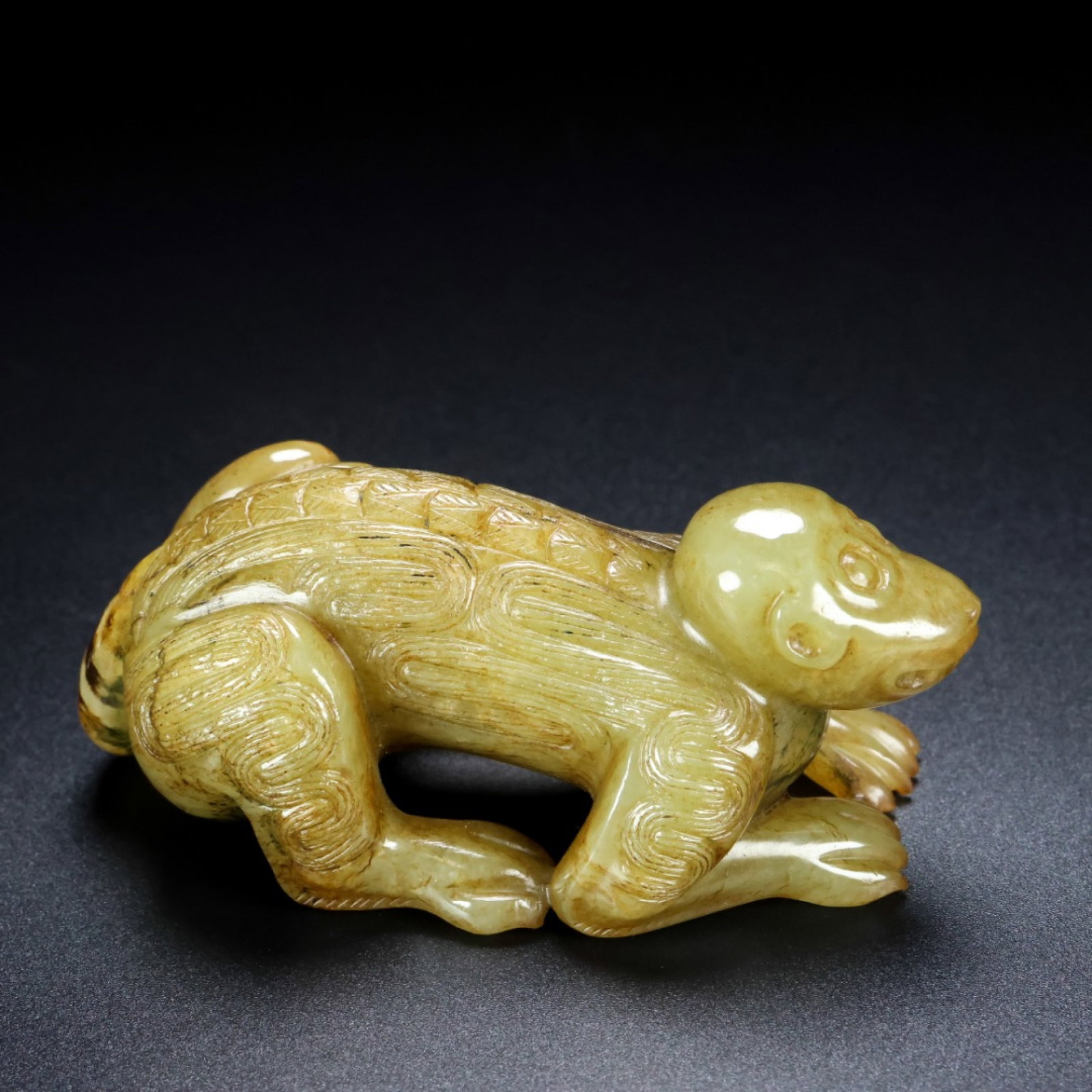 An Archaic Gaogu yu Monkey Ornament: An Archaic Gaogu yu Monkey Ornament,Ancient Time, China, Size:3.1inx1.6inx1.2in, Weight:137g 高古玉猴子摆件,中国远古时期,