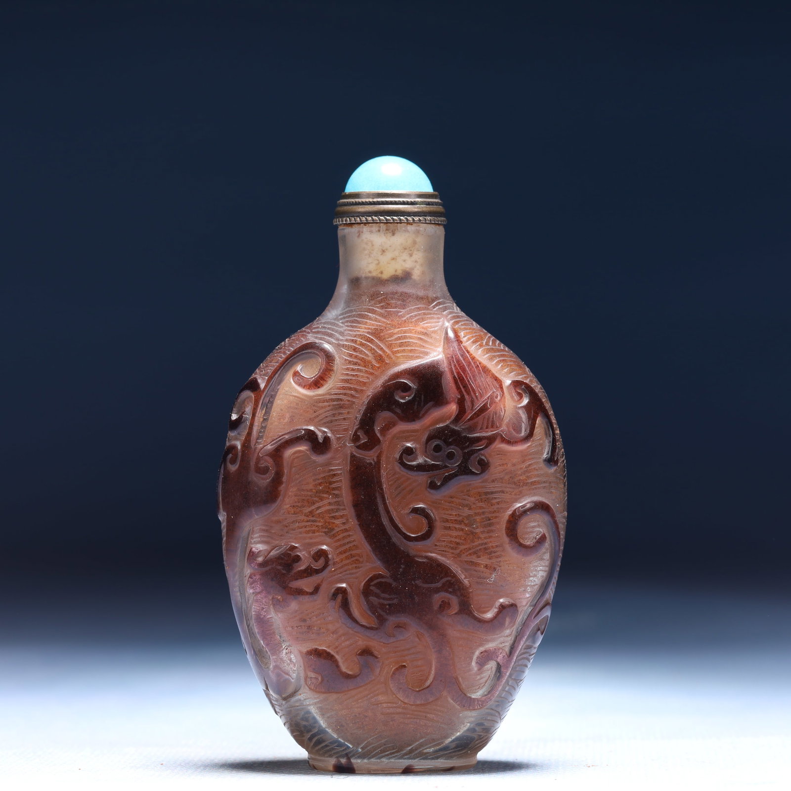An Exquisite Glass Chi-Dragon Pattern Snuff Bottle: An Exquisite Glass Chi-Dragon Pattern Snuff Bottle,Qing Dynasty,China,Daoguang Four-character Mark,Size:2inx1inx3.3in,Weight:77g