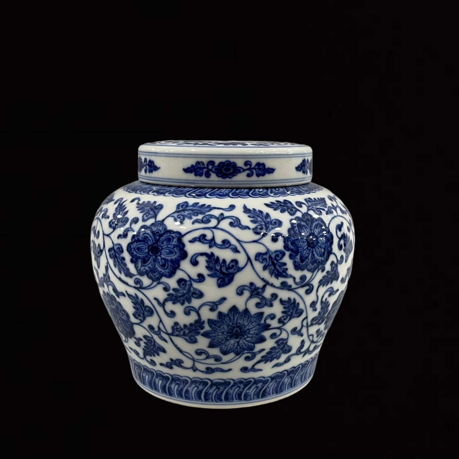An Exquisite Blue and White Lotus Pattern Jar with Cover: An Exquisite Blue and White Lotus Pattern Jar with Cover,Qing Dynasty,China,Qianlong Six-character Mark,Size:5.3inx5.5in