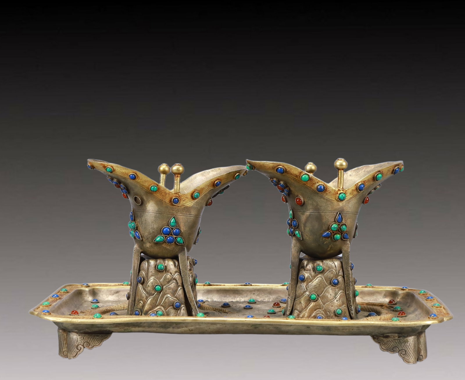 A Set of Rare Gilt Silver Dragon Pattern Goblets,Inlaid Turquoise: A Set of Rare Gilt Silver Dragon Pattern Goblets,Inlaid Turquoise,Tang Dynasty, China,Size:10.6inx5.7inx5.1in,Weight:1200g 一套银鎏金龙纹爵杯,