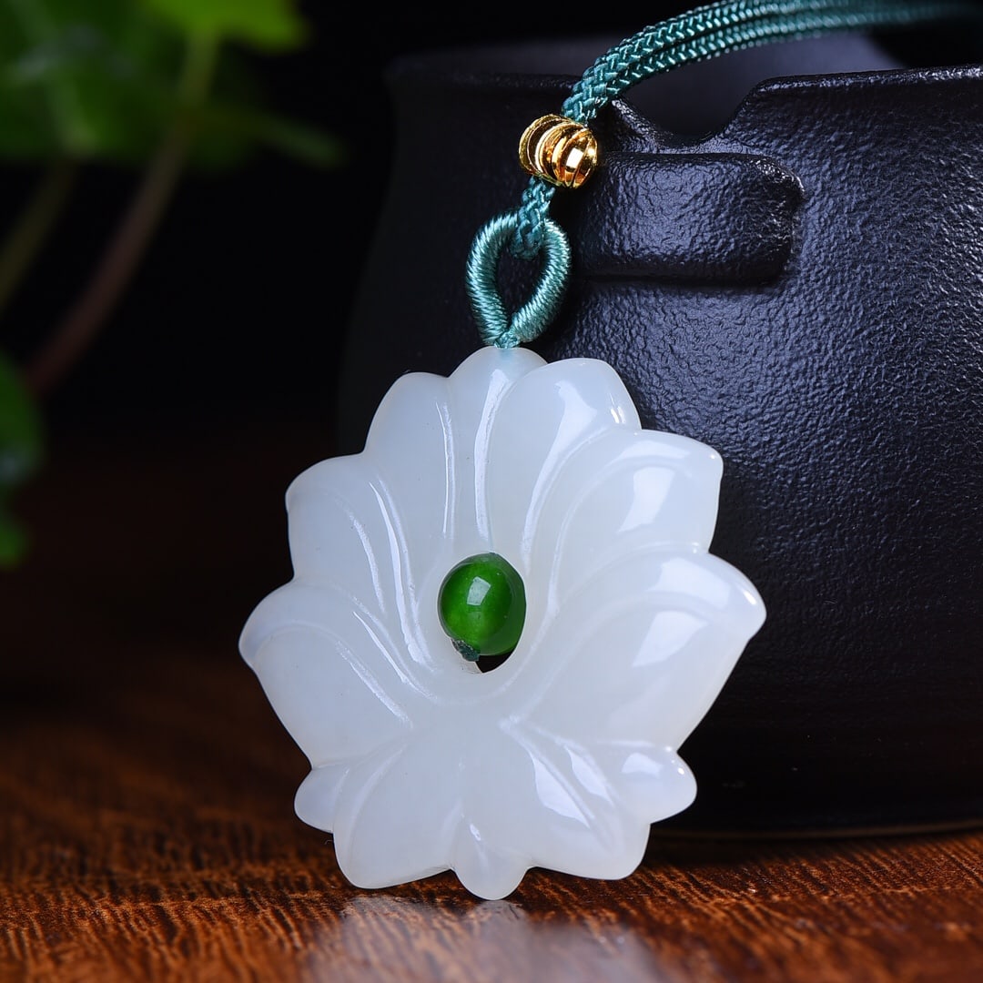 An Exquisite White Jade Lotus Pendant (1 of 5)