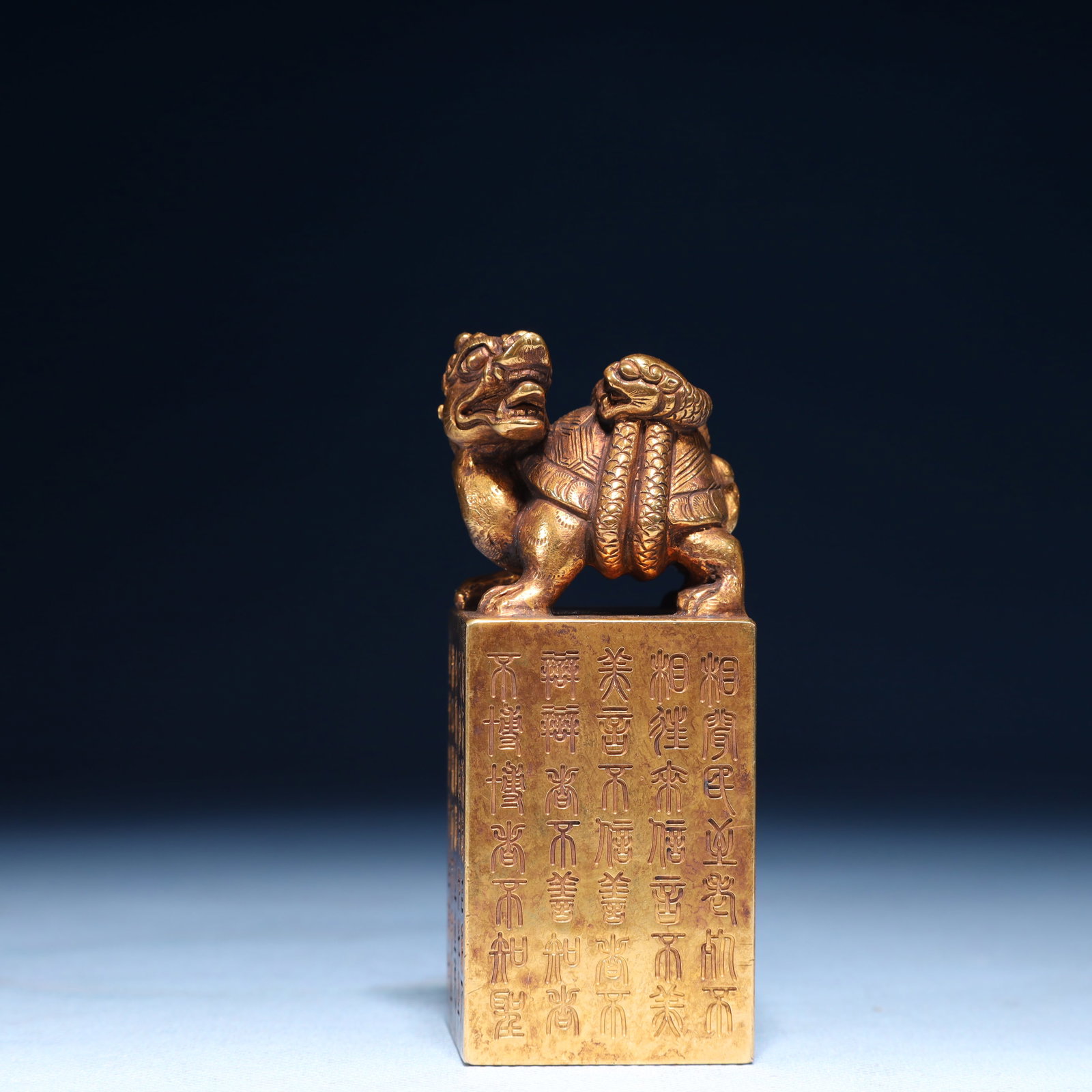 An Exquisite Gilt Bronze Auspicious Beast Seal,With Inscription: An Exquisite Gilt Bronze Auspicious Beast Seal,With Inscription,Qing Dynasty,China,Size:1.8inx3.8in,Weight:950g 铜鎏金瑞兽印章,带铭文,ߑ