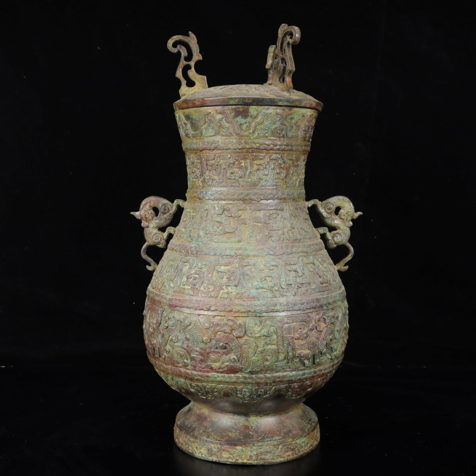 An Archaic Bronze Chi-Dragon Pattern Double-Ears Jar: An Archaic Bronze Chi-Dragon Pattern Double-Ears Jar,The Warring States period in China,Size:9.1inx7.9inx16.5in,Weight:6600g