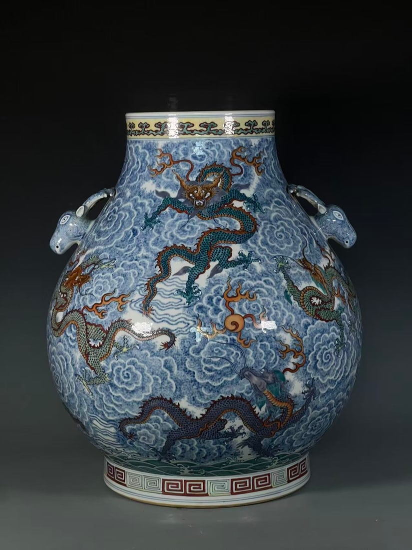 A Huge Blue and White Doucai Auspicious Cloud and Dragon Pattern Deer-Ears Vase: A Huge Blue and White Doucai Auspicious Cloud and Dragon Pattern Deer-Ears Vase,Qing Dynasty,China,Qianlong Six-character Mark,Size:19.5inx7.6inx10.9in 青花斗彩祥云