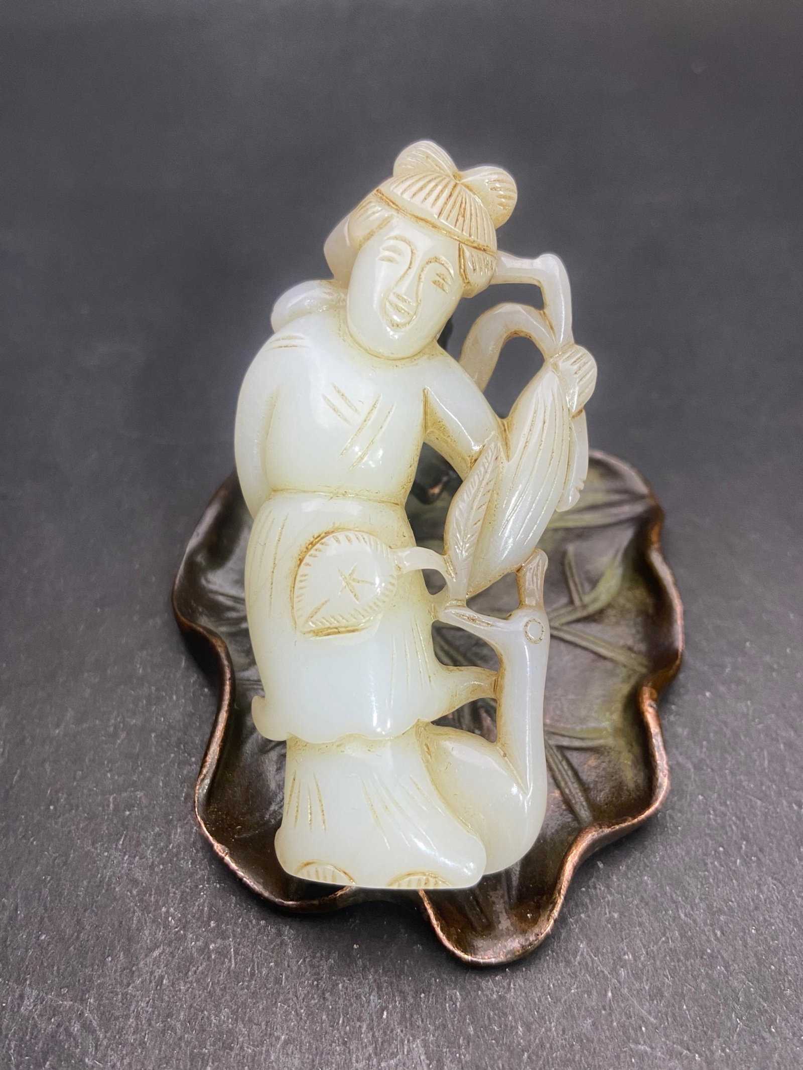 An Exquisite White Jade Figure Pendant: An Exquisite White Jade Figure Pendant,Qing Dynasty,China,Size:2.8inx1.4inx0.7in,Weight:48g 白玉人物挂件,中国清代