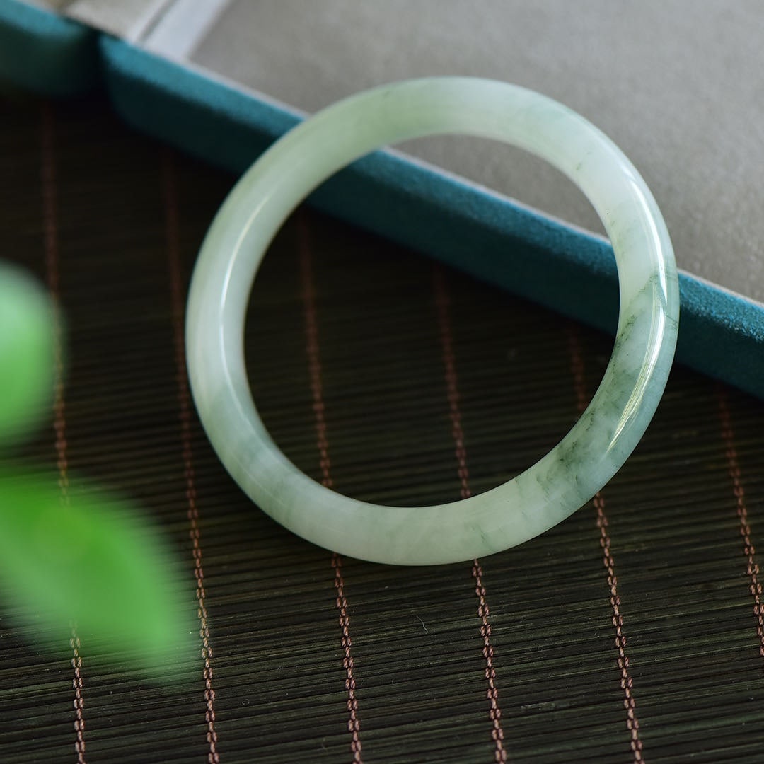 An Exquisite Greenish Jade Bracelet: An Exquisite Greenish Jade Bracelet,Size:2in-2.4in 青玉手镯
