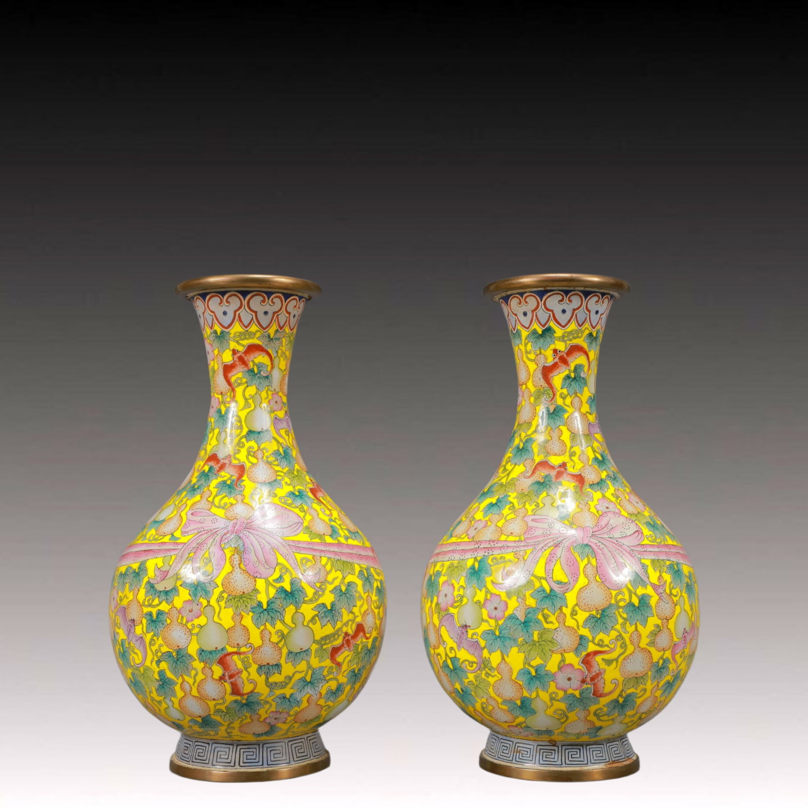 A Pair of Exquisite Painted Enamel Bats and Gourd Pattern Vases: A Pair of Exquisite Painted Enamel Bats and Gourd Pattern Vases,Qing Dynasty, China,Qianlong Four-character Mark,Size:5.5inx10.2in,Total Weight:1850g 一对画珐琅福&#