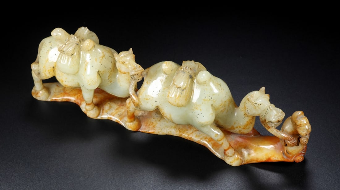 An Exquisite White Jade Camel Ornament: An Exquisite White Jade Camel Ornament,Qing Dynasty,China,Size:11.8inx2.2inx3.9in,Weight:1237g 白玉骆驼摆件,中国清代