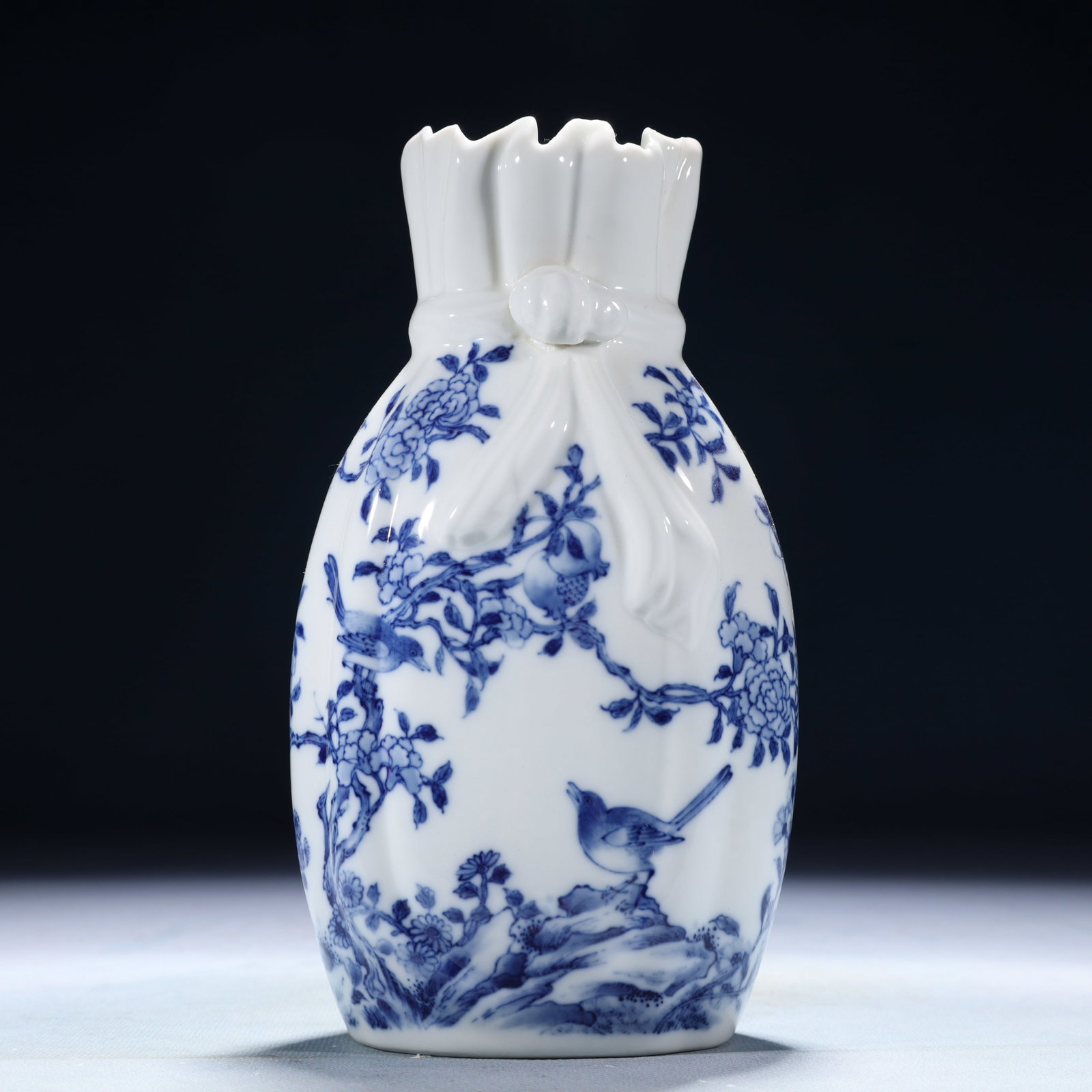 An Exquisite Blue and White Flower and Bird Pattern Vase: An Exquisite Blue and White Flower and Bird Pattern Vase,Qing Dynasty,China,Yongzheng Six-character Mark,Size:4.3inx2.4inx7.1in,Weight:1200g