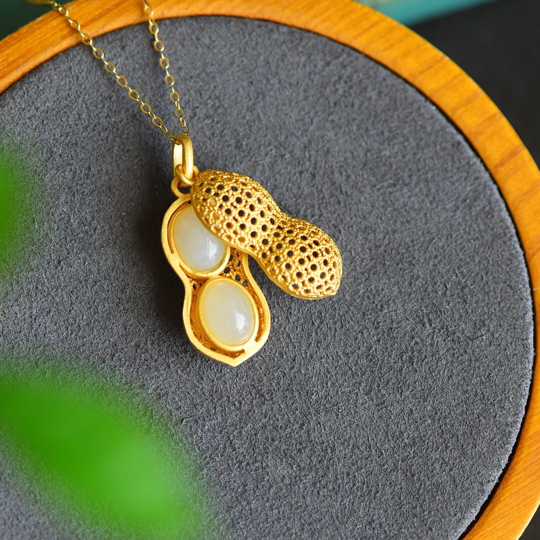 An Exquisite Sterling Silver-Gold Plated Inlaid White Jade Pendant: An Exquisite Sterling Silver-Gold Plated Inlaid White Jade Pendant 纯银镀金镶白玉吊坠