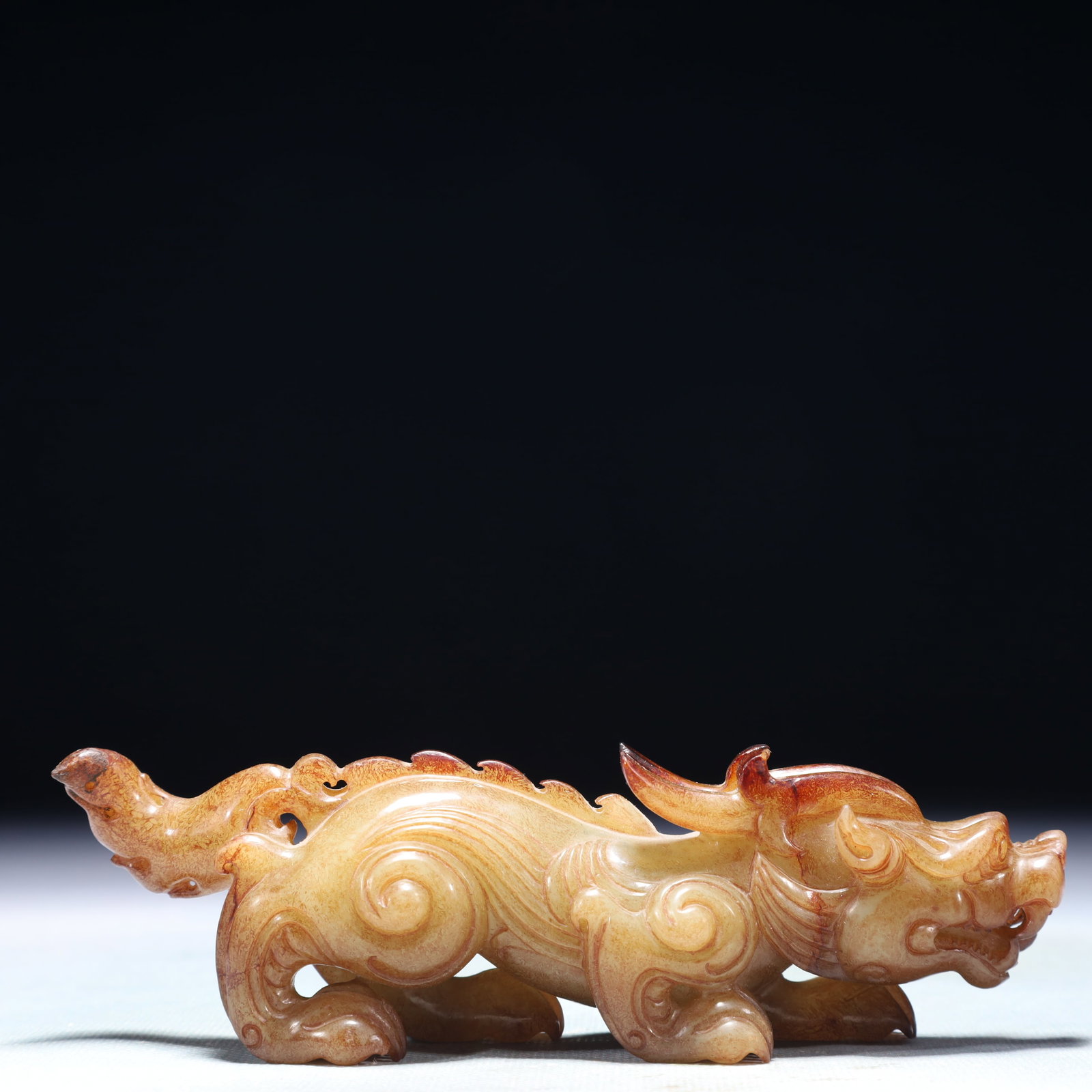 An Exquisite Archaic Jade Beast Ornament: An Exquisite Archaic Jade Beast Ornament,Ancient Time,China,Size:5.9inx1.6inx2in,Weight:271.8g 高古玉兽摆件,中国远古时期