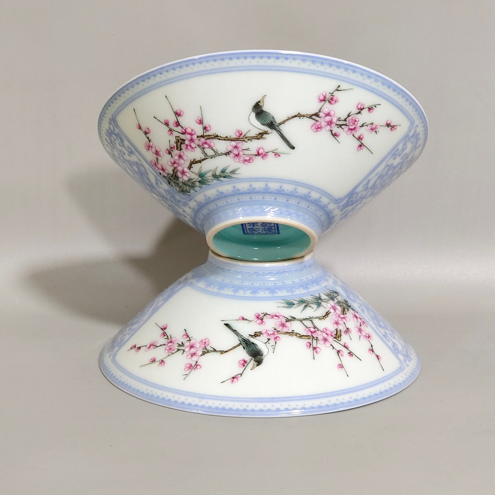 A Pair of Exquisite Enamel Flower and Bird Pattern Cups: A Pair of Exquisite Enamel Flower and Bird Pattern Cups,Qing Dynasty,China,Qianlong Four-character Mark,Size:1.4inx4in