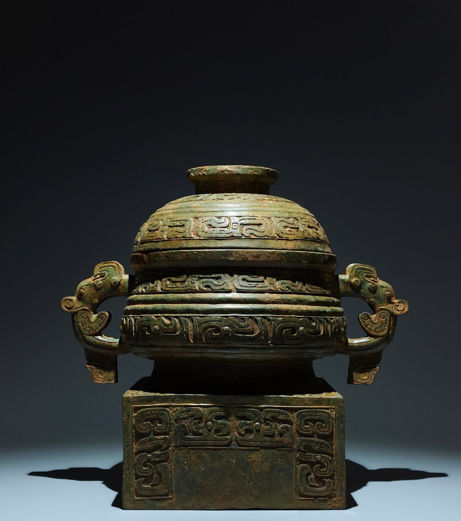 An Archaic Bronze Chi-Dragon Pattern Beast-Ears Food Vessel: An Archaic Bronze Chi-Dragon Pattern Beast-Ears Food Vessel,W.Zhou,China,Size:15inx16.1inx9.4in 青铜螭龙纹兽耳食器,中国西周