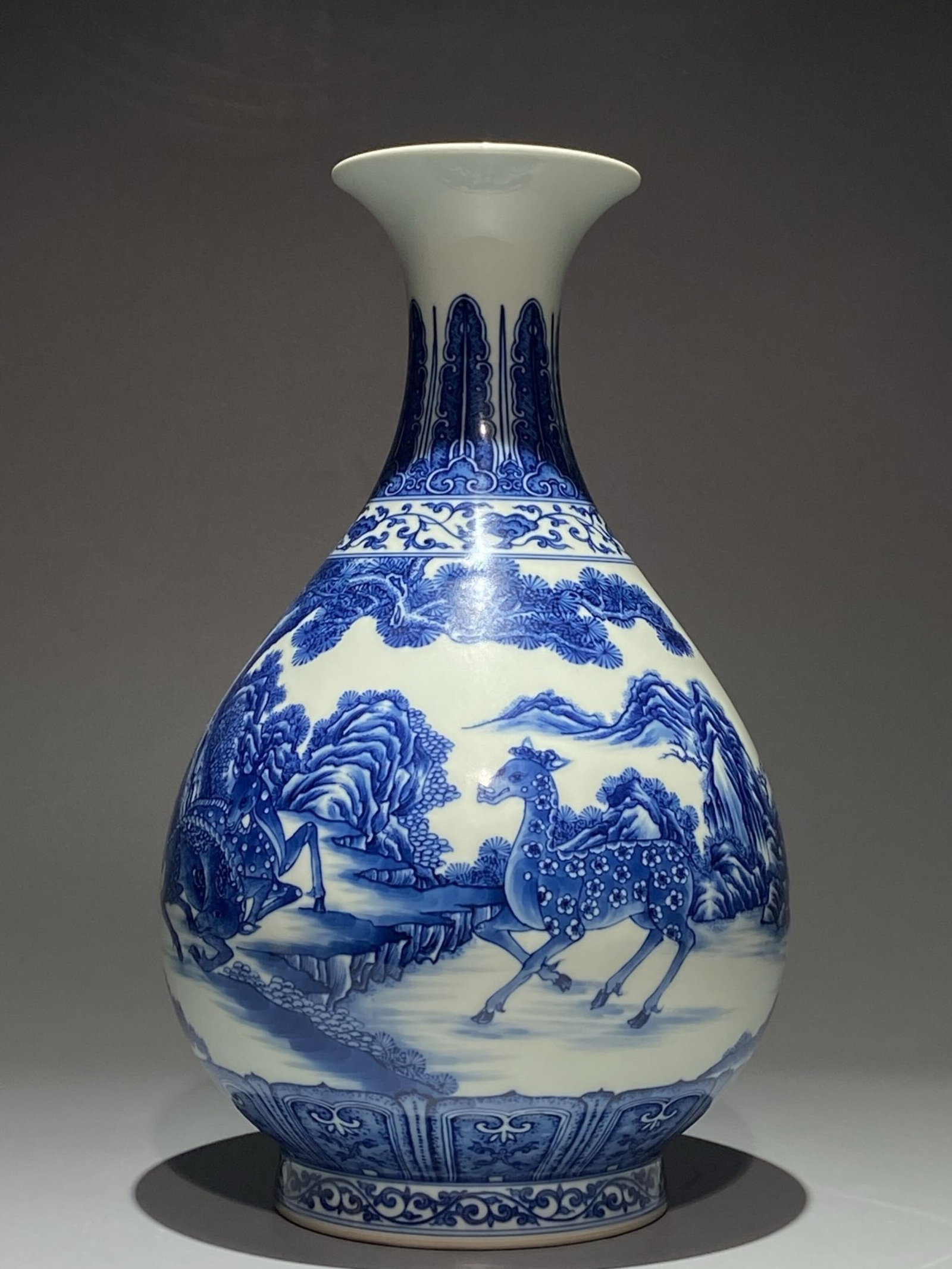 A Rare Blue and White Pine and Deer Pattern Vase: A Rare Blue and White Pine and Deer Pattern Vase,Qing Dynasty,China,Qianlong Six-character Mark,Size:13.4inx8.3in