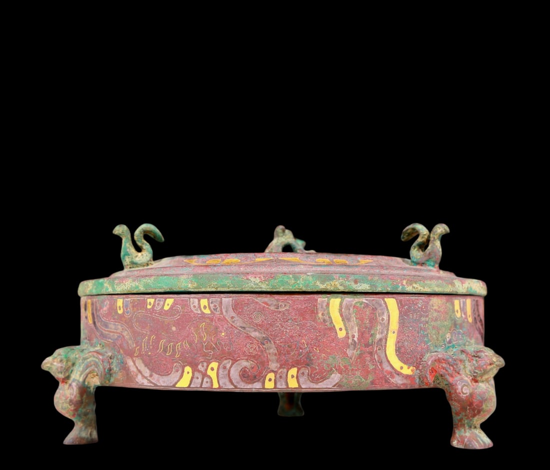 A precious bronze inlaid gold and silver tripod jar with auspicious animal patterns and lid (1 of 7)