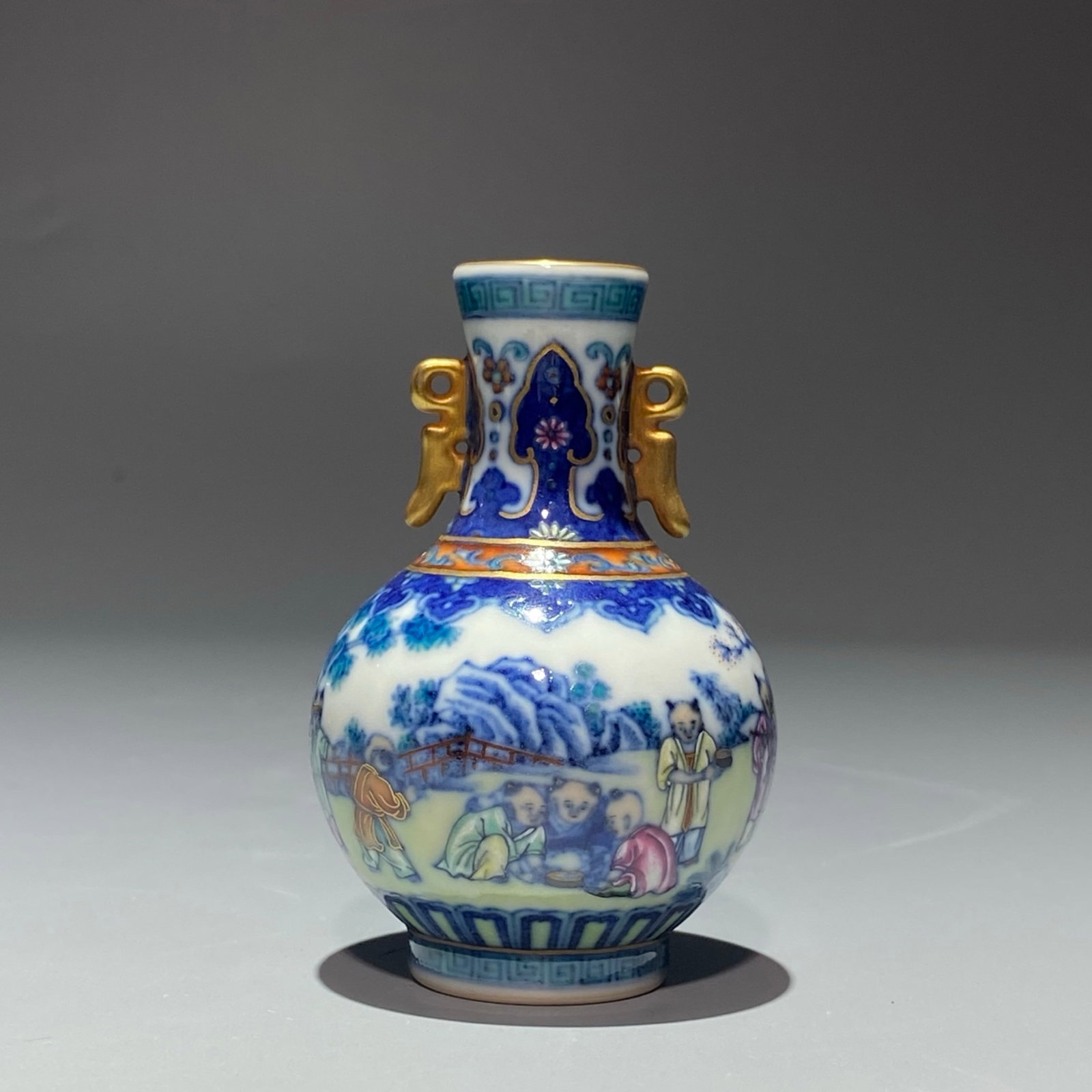 An Exquisite Blue and White Famille-Rose Painted Gold Figure Pattern Double-Ears Vase: An Exquisite Blue and White Famille-Rose Painted Gold Figure Pattern Double-Ears Vase,Qing Dynasty,China,Qianlong Four-character Mark,Size:3.3inx2.2in 青花粉彩描金&