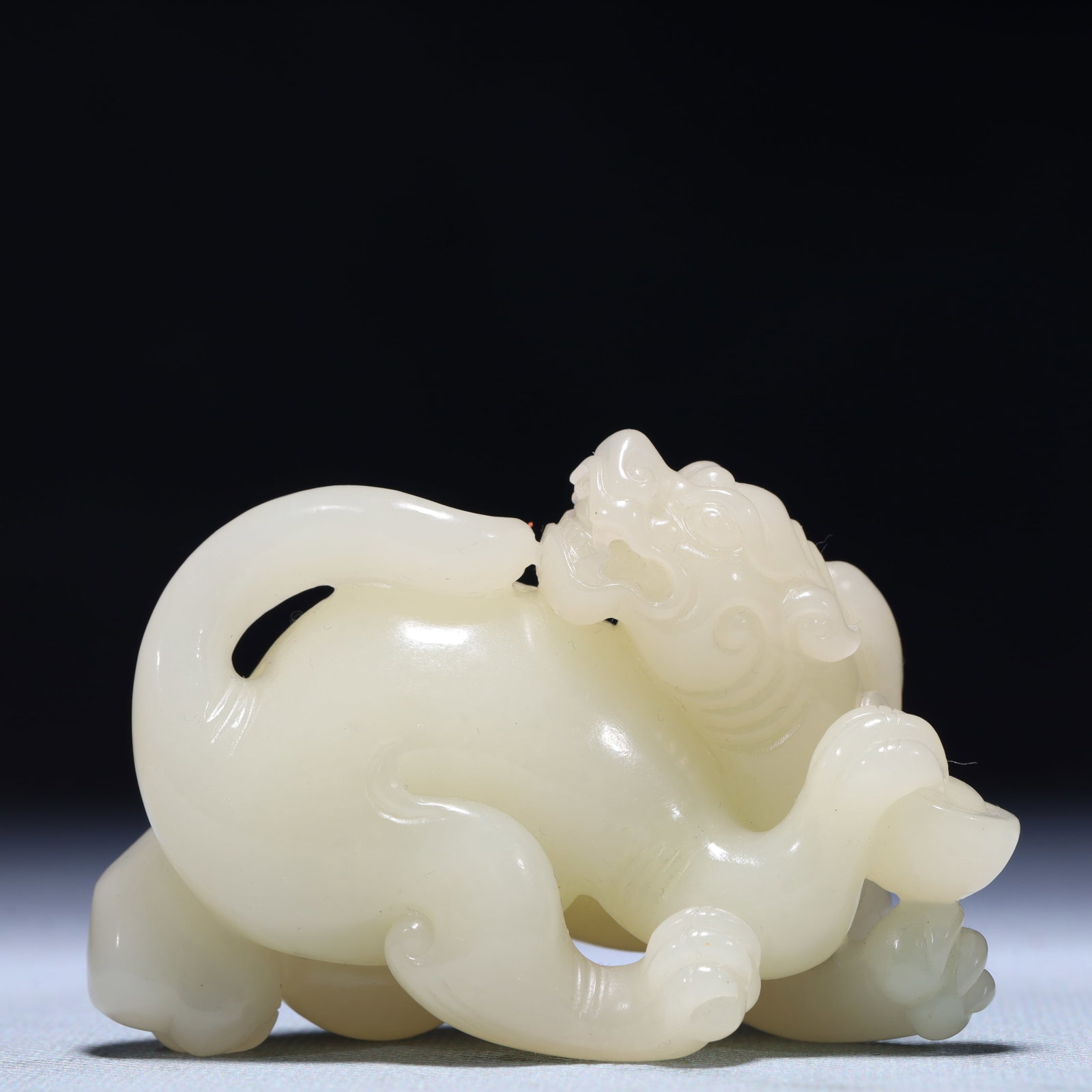 An Exquisite White Jade Auspicious Beast Ornament (1 of 9)