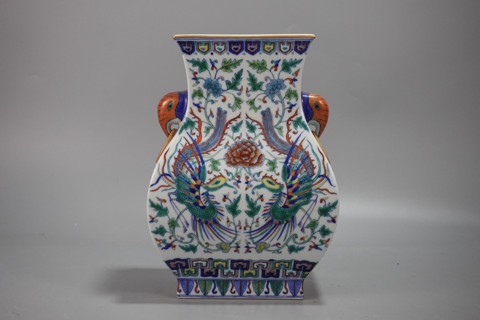 An Exquisite Doucai Blue and White Painted Gold Lotus and Phoenix Pattern Elephant-Ears Vase: An Exquisite Doucai Blue and White Painted Gold Lotus and Phoenix Pattern Elephant-Ears Vase,Qing Dynasty,China,Qianlong Six-character Mark,Size:10.6inx7.5in 斗彩青花描&#