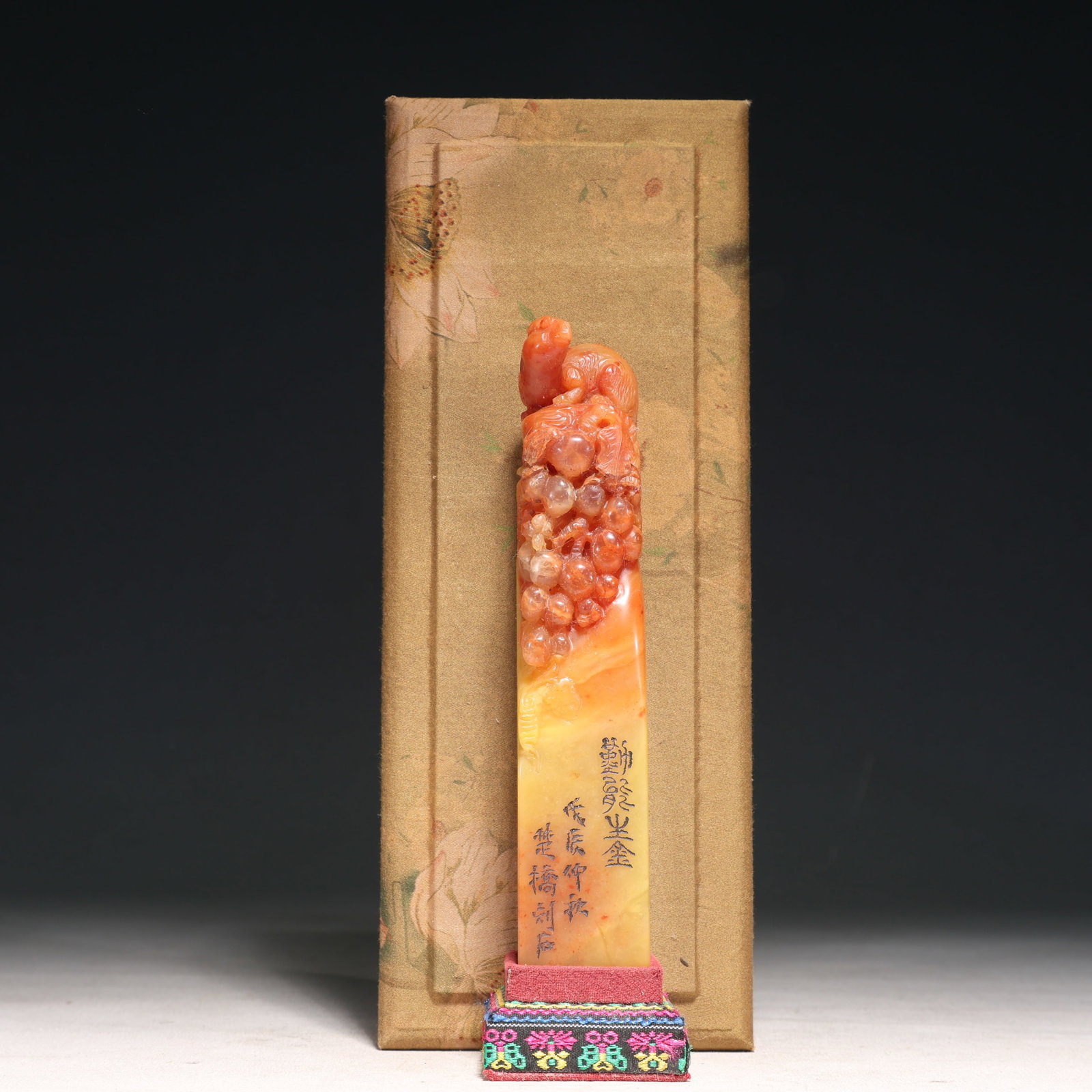 An Exquisite Tianhuang Stone Squirrel and Grapes Pattern Seal: An Exquisite Tianhuang Stone Squirrel and Grapes Pattern Seal,Qing Dynasty,China,Size:1.4inx6.9in,(Box)3.9inx10.2inx3in,Weight:400g 田黄石松鼠葡萄纹