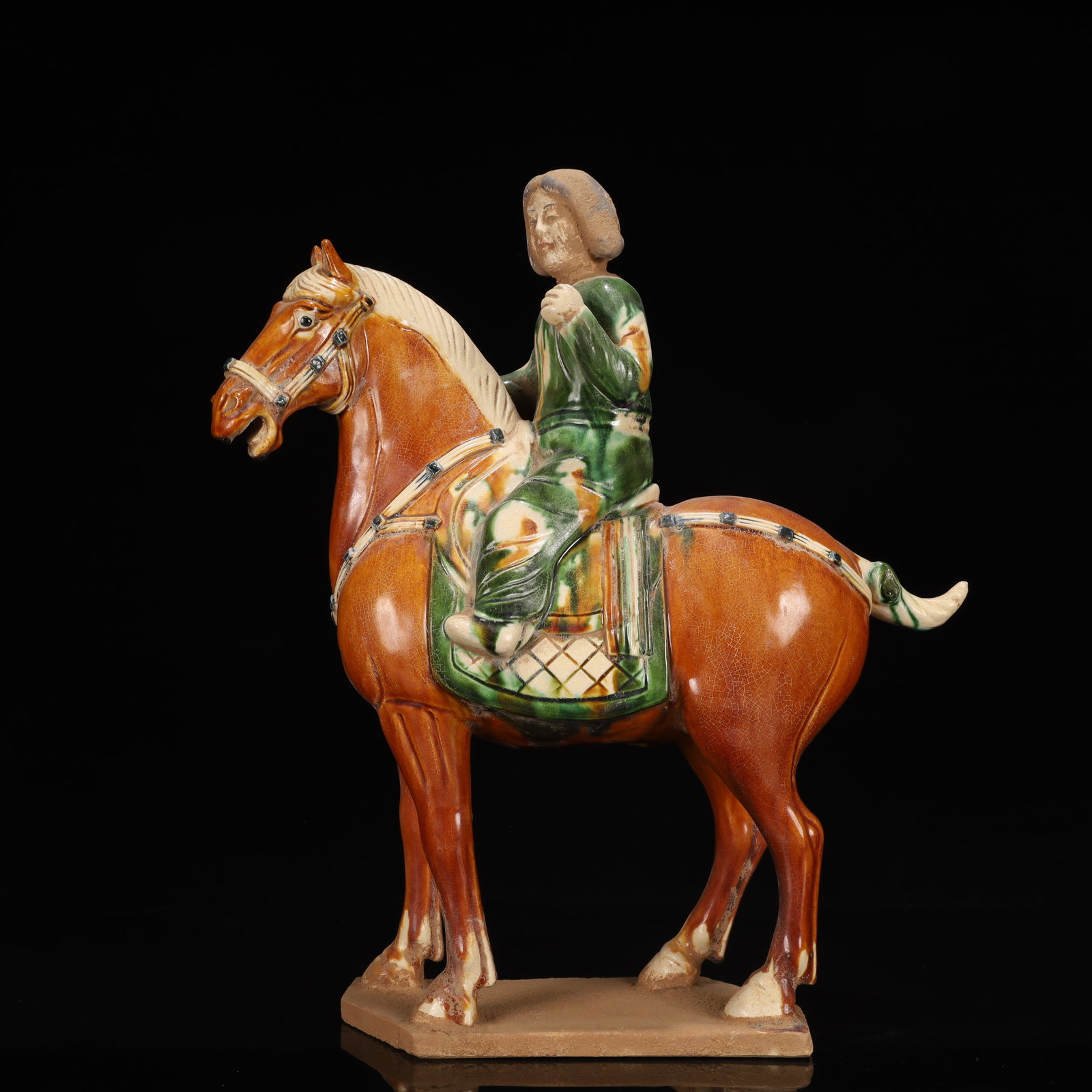 A Rare Tang Tri-Color Glazed Pottery Figure Riding Horse Ornament: A Rare Tang Tri-Color Glazed Pottery Figure Riding Horse Ornament,Tang Dynasty, China,Chinese Tang Tri-colored Pottery, or Tang Sancai, flourished during the Tang Dynasty (618–907 AD). It's