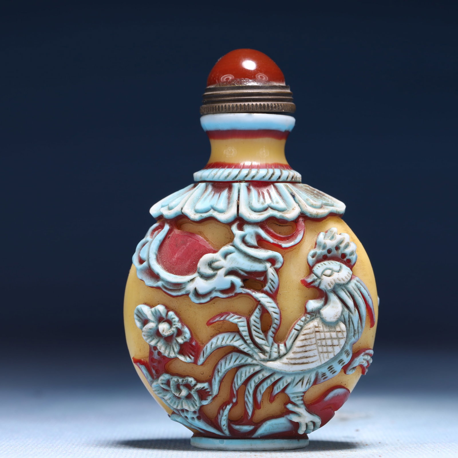 An Exquisite Glass Flower and Rooster Pattern Snuff Bottle: An Exquisite Glass Flower and Rooster Pattern Snuff Bottle,Qing Dynasty,China,Qianlong Four-character Mark,Size:2inx1.2inx3.1in,Weight:88g 琉璃花卉鸡纹鼻Ġ