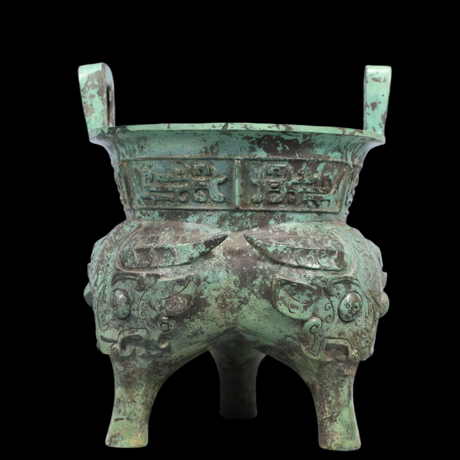 A Precious Bronze Beast-Face Pattern Double-Ears and Tripod Censer: A Precious Bronze Beast-Face Pattern Double-Ears and Tripod Censer,Ancient Time, China,Size: 7.5inx9.1in ;Weight: 2450g