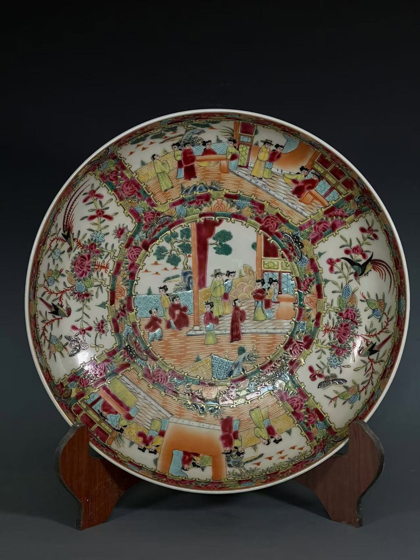 An Exquisite Famille-Rose Painted Gold Figure,Flower and Bird Pattern Plate: An Exquisite Famille-Rose Painted Gold Figure,Flower and Bird Pattern Plate,Qing Dynasty,China,Size:3.1inx14.9inx9.8in 粉彩描金人物花鸟纹盘,
