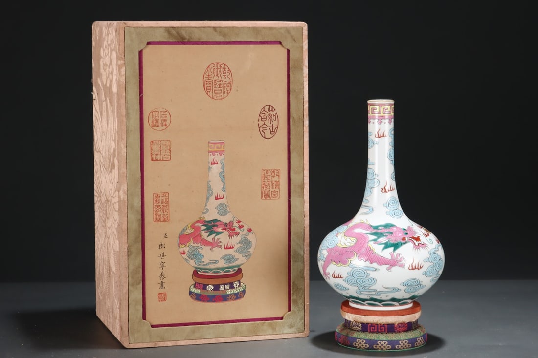 An Exquisite Famille-Rose Painted Gold Auspicious Cloud and Dragon Pattern Vase: An Exquisite Famille-Rose Painted Gold Auspicious Cloud and Dragon Pattern Vase,Qing Dynasty,China,Qianlong Six-character Mark,Size:9.7inx5.9in