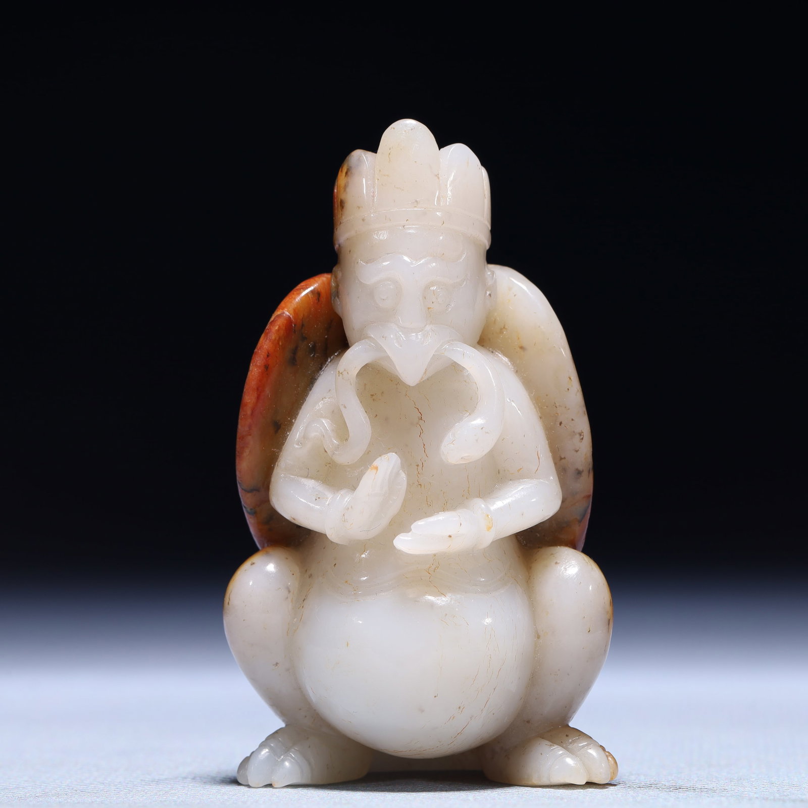 An Exquisite White Jade Roc Ornament: An Exquisite White Jade Roc Ornament,Qing Dynasty,China,Size:1.8inx1inx2.8in,Weight:107.5g 白玉大鹏鸟摆件,中国清代