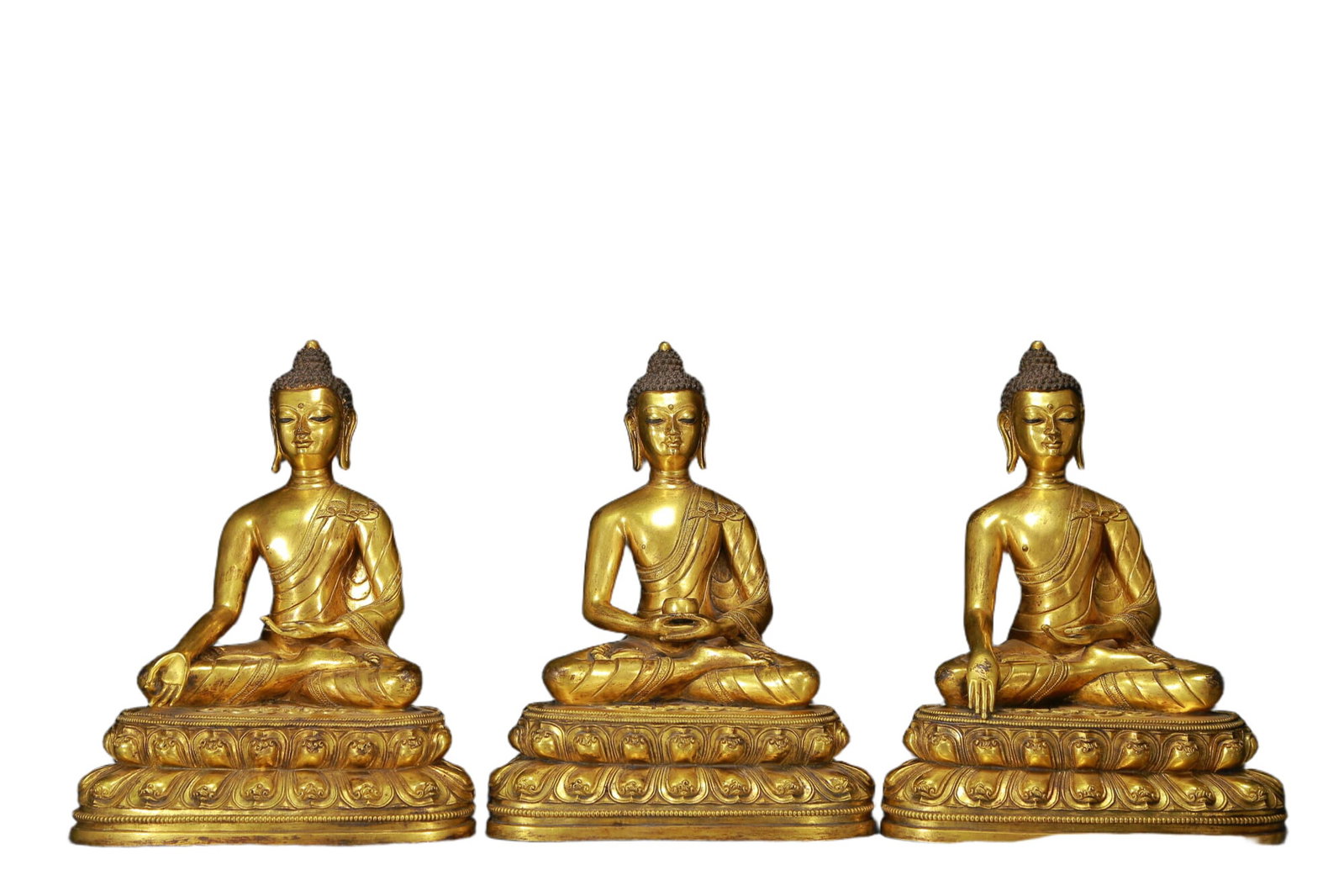 A Set of Solemn Gilt Bronze Statue of Sakyamuni: A Set of Solemn Gilt Bronze Statue of Sakyamuni,Qing Dynasty, China,Size:8.7inx5.1inx11.8in,Weight:14820g