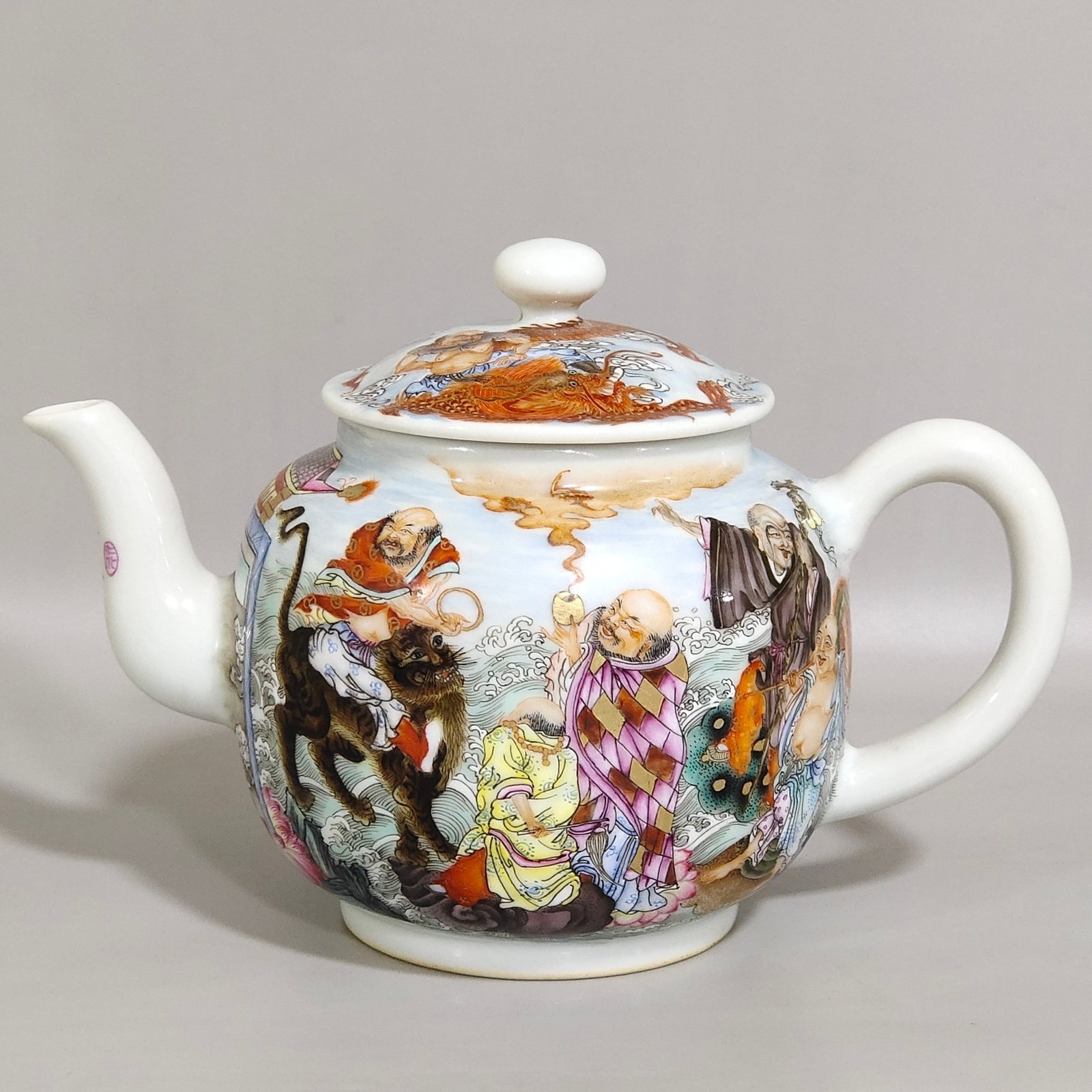 An Exquisite Famille-Rose Seawater Figure Pattern Teapot: An Exquisite Famille-Rose Seawater Figure Pattern Teapot,Qing Dynasty,China,Yongzheng Four-character Mark,Size:4.5inx6.5in