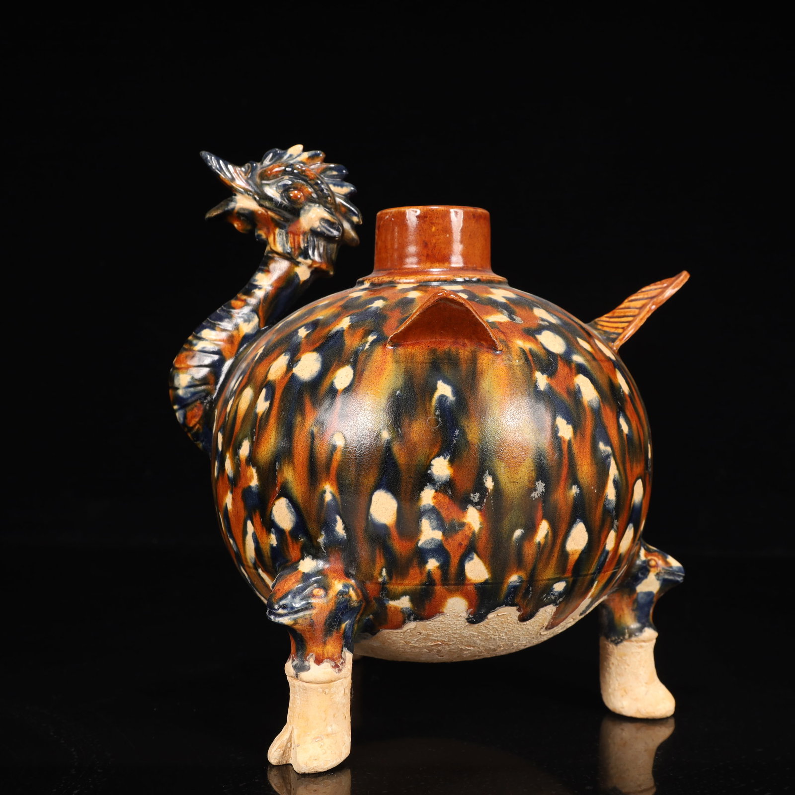 A Rare Tang Tri-Color Glazed Pottery Tripod Jar: A Rare Tang Tri-Color Glazed Pottery Tripod Jar,Tang Dynasty, China,Chinese Tang Tri-colored Pottery, or Tang Sancai, flourished during the Tang Dynasty (618–907 AD). It's renowned for its